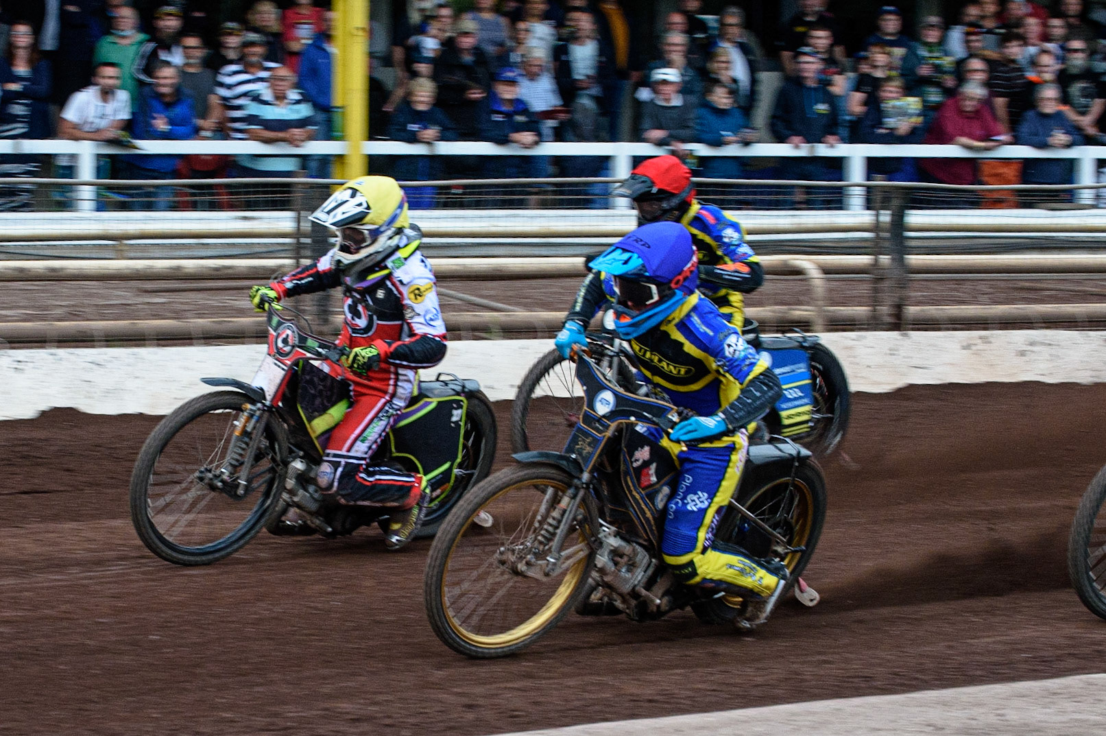SHEFFIELD, UK. JULY 1ST     Justin Sedgmen   (Blue) inside Tom Brennan  (Yellow) with Adam Ellis  (Red) on the outside during the SGB Premiership match between Sheffield Tigers and Belle Vue Aces at Owlerton Stadium, Sheffield on Thursday 1st July 2021. (Credit: Ian Charles | MI News)