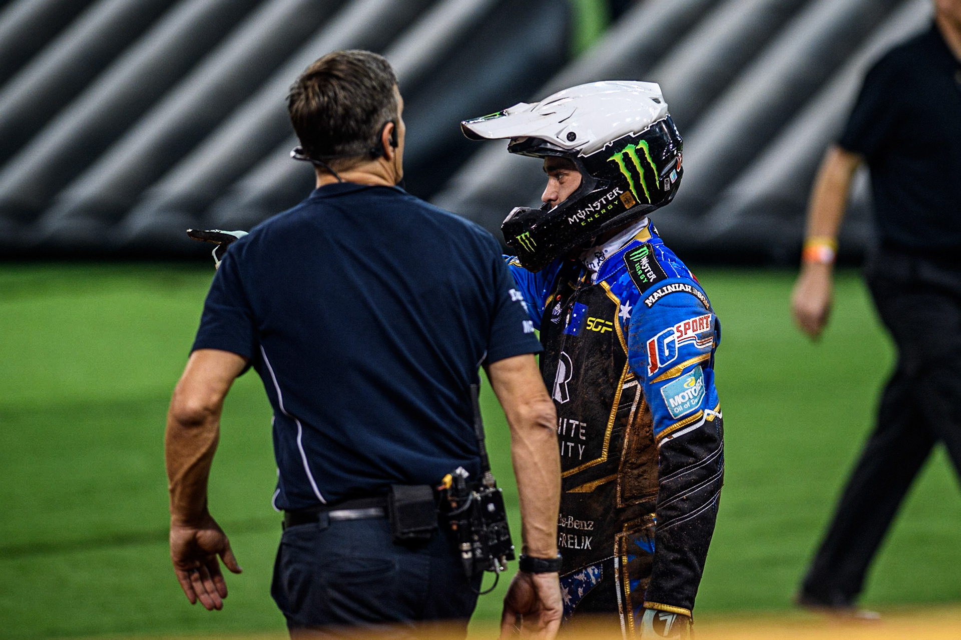 Jack Holder (25) (Red) tells SGP Race Director Phil Morris what happened leading t his fall during the FIM Speedway Grand Prix of Great Britain at the Principality Stadium, Cardiff on Saturday 2nd September 2023. (Photo: Ian Charles | MI News)