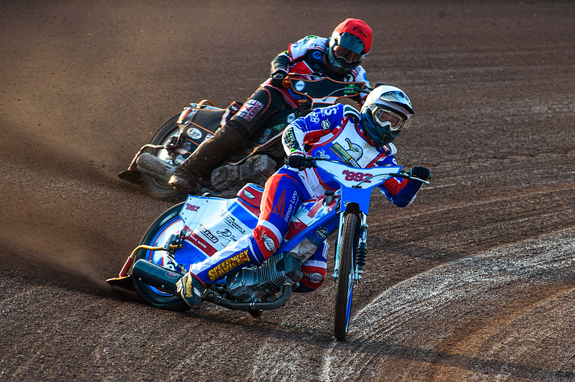 MANCHESTER, UK. JULY 23RD Jake Knight  (White) leads Jack Smith  (Red) during the National Development League match between Belle Vue Colts and Eastbourne Seagulls at the National Speedway Stadium, Manchester on Friday 23rd July 2021. (Credit: Ian Charles | MI News)