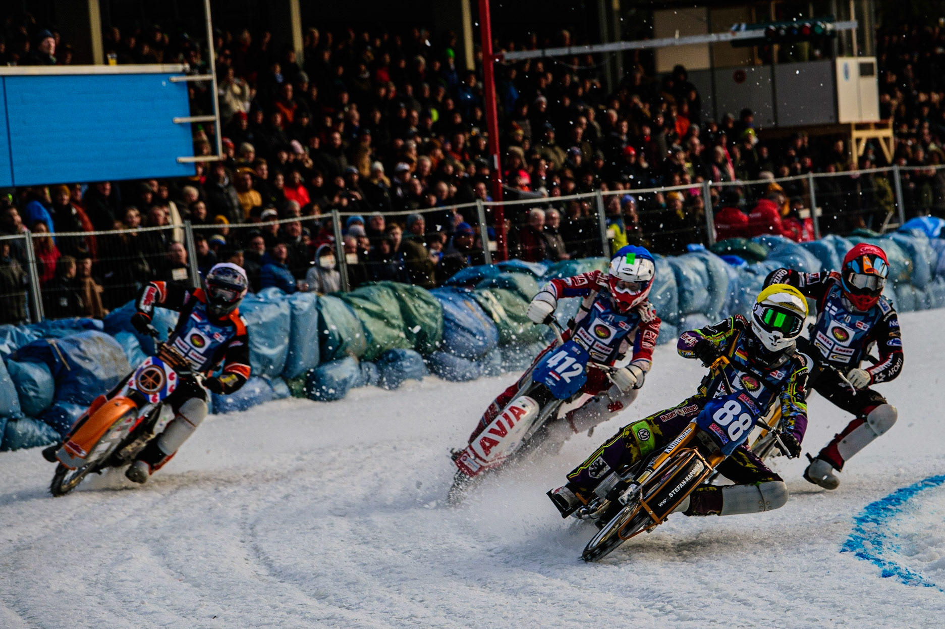 Max Neidermaier (Yellow) leads Topi Mustonen (Red) Niek Schaap (Blue) and Sebastian Reitsma (White) during the German Individual Ice Speedway Championship at Horst-Dohm-Eisstadion, Berlin on Friday 3rd March 2023. (Photo: Ian Charles | MI News)