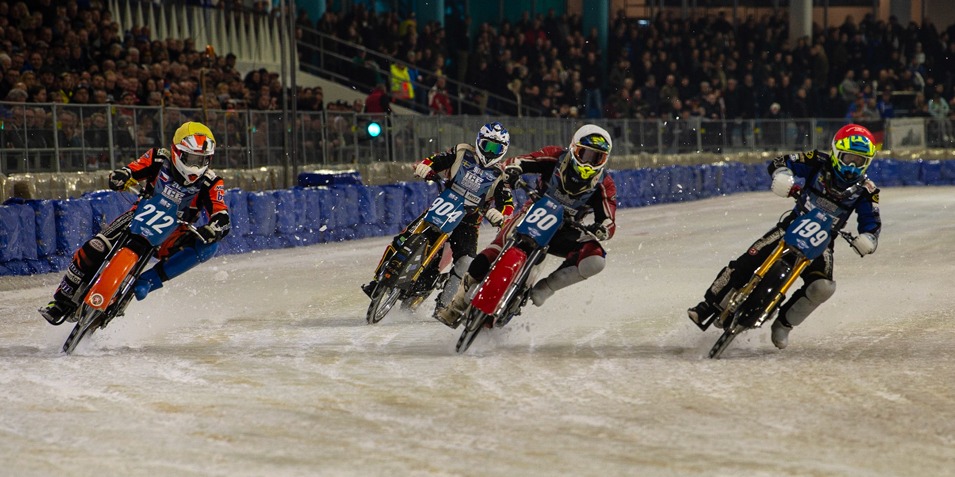 HEERENVEEN, NL. Martin Hååruhiltunen (199)  (Red) inside Jiri Wildt (80) (White) and Lukas Hutla (212) (Yellow) with Joakim Söderström (904) (Blue) behind during the FIM Ice Speedway Gladiators World Championship Final 3 at Ice Rink Thialf, Heerenveen on Saturday  2 April 2022. (Credit: Ian Charles | MI News)
