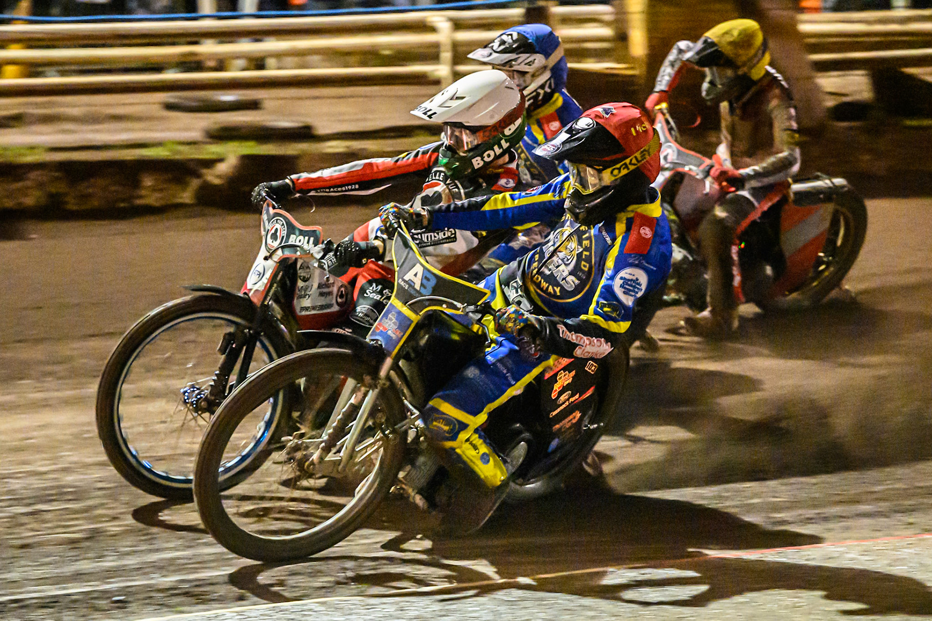 Josh Pickering of Sheffield Tigers in Red on the inside of Brady Kurtz of Belle Vue Aces in White , Jye Etheridge of Sheffield Tigers in Blue and Norick Blodorn of Belle Vue Aces in Yellow during the Rowe Motor Oil Premiership Grand Final 1st Leg match between Sheffield Tigers and Belle Vue Aces at Owlerton Stadium, Sheffield on Monday 12th October 2026. (Photo: Ian Charles | MI News)