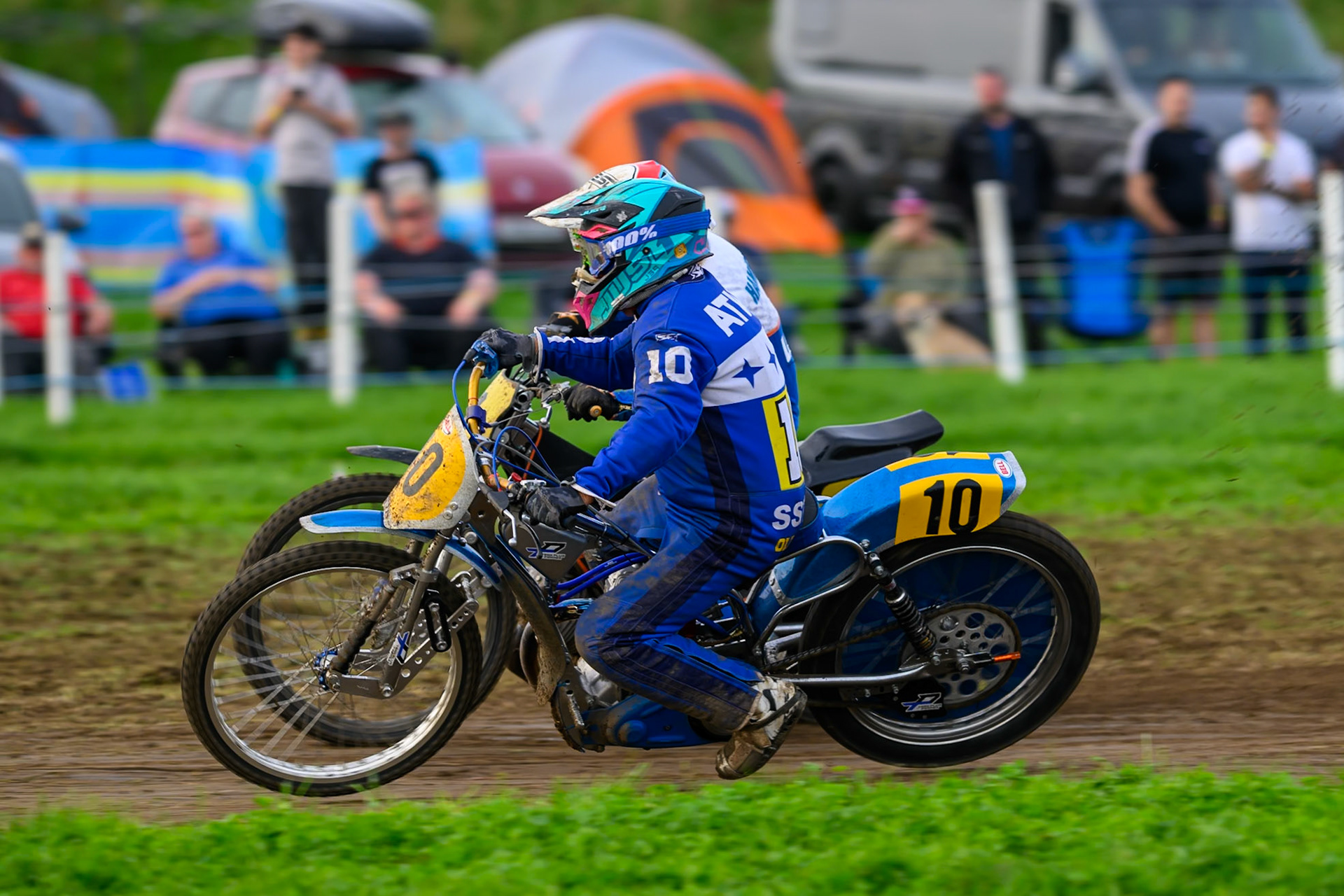British Masters (Solos): Tony Atkin (10) on the inside of Simon Hammersley (4) during the British Masters Grasstrack Championship at Lower Marsh Farm, Much Hoole, Preston in Lancashire, England on Sunday 13th September 2026. (Photo: Ian Charles | MI News)
