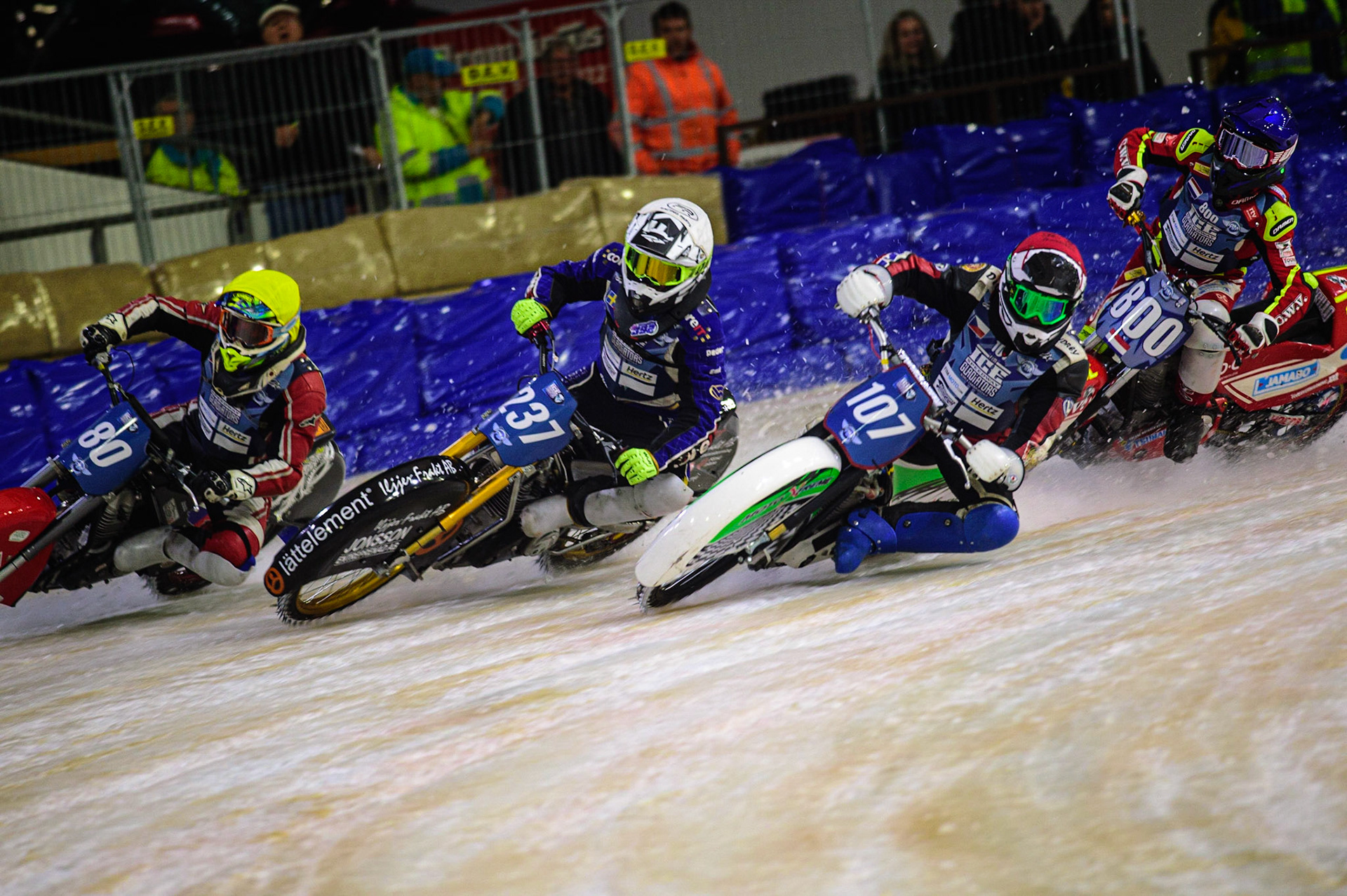 HEERENVEEN, NL. Jasper Iwema (800) (Blue) gets into some difficulty behind Andrej Divis (107) (Red) Jimmy Hörrnell (237)  (White) and Jiri Wildt (80) (Yellow)  during the FIM Ice Speedway Gladiators World Championship Final 4 at Ice Rink Thialf, Heerenveen on Sunday  3 April 2022. (Credit: Ian Charles | MI News)