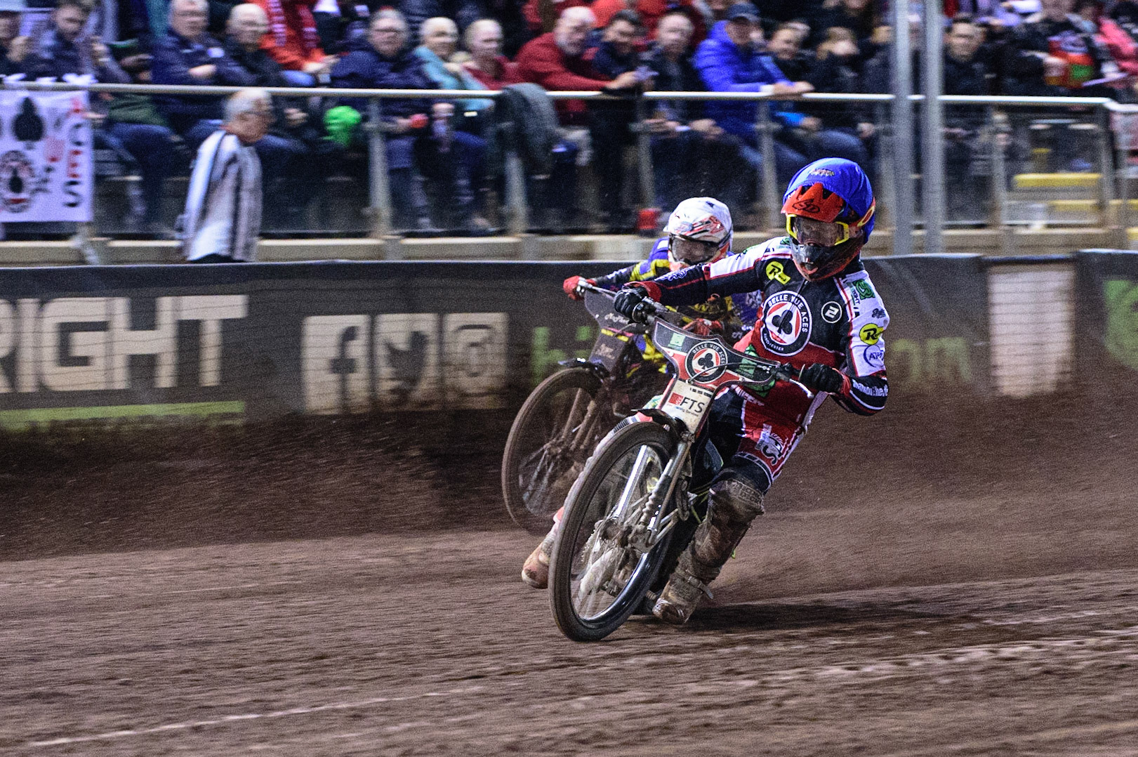 MANCHESTER, UK. OCT 7TH  Jye Etheridge   (Blue) leads Josh Pickering   (White) on the final lap of heat 14 during the SGB Premiership Play off Semi-Final Second Leg between Belle Vue Aces and Sheffield Tigers at the National Speedway Stadium, Manchester on Thursday 7th October 2021. (Credit: Ian Charles | MI News)