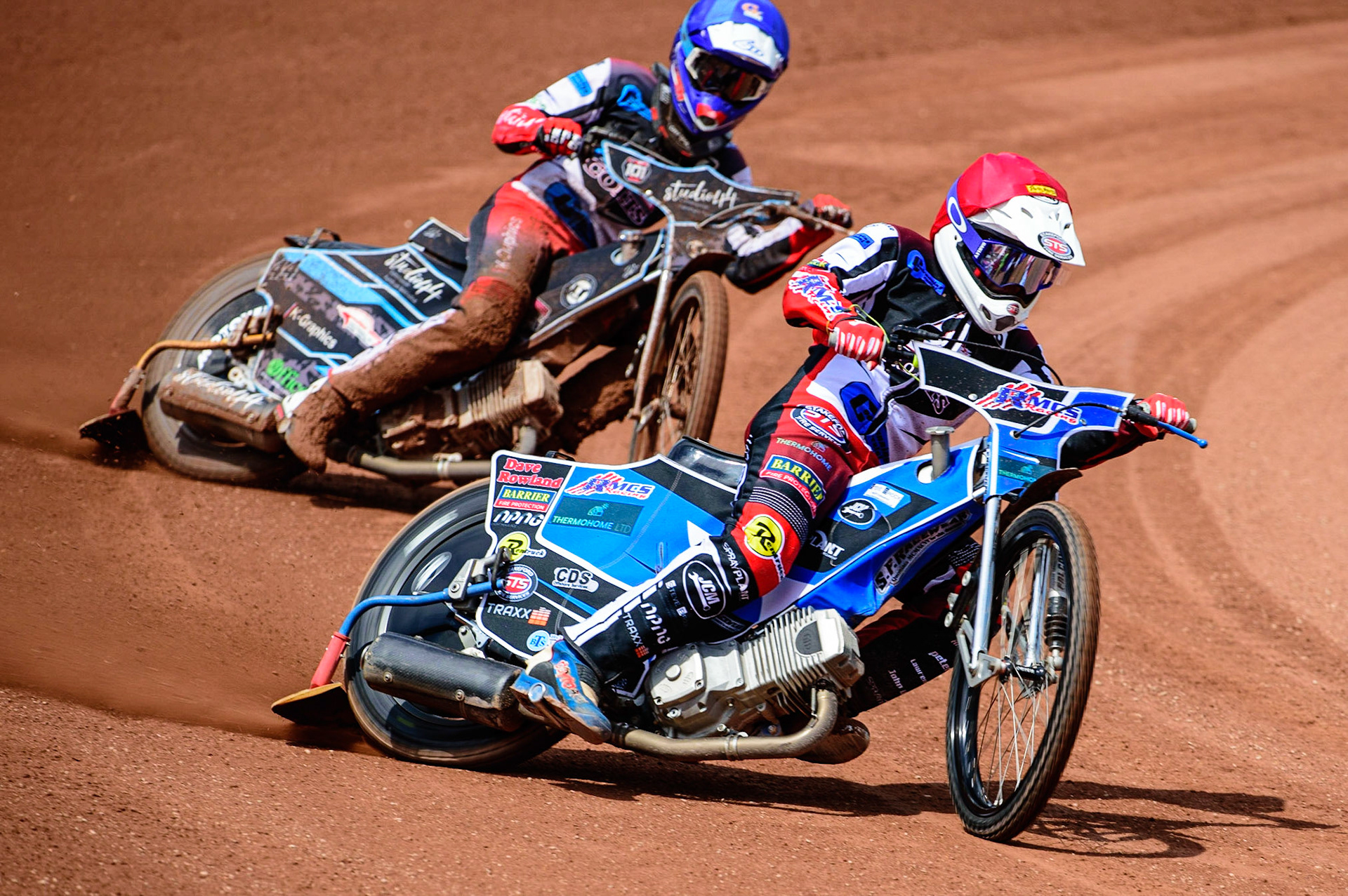 MANCHESTER, UK.  JUN 3RD  Archie Freeman  (Red) leads team mate Freddy Hodder  (Blue) as the Colts go for maximum heat points during the National Development League match between Belle Vue Colts and Oxford Chargers at the National Speedway Stadium, Manchester on Friday 3rd June 2022. (Credit: Ian Charles | MI News)
