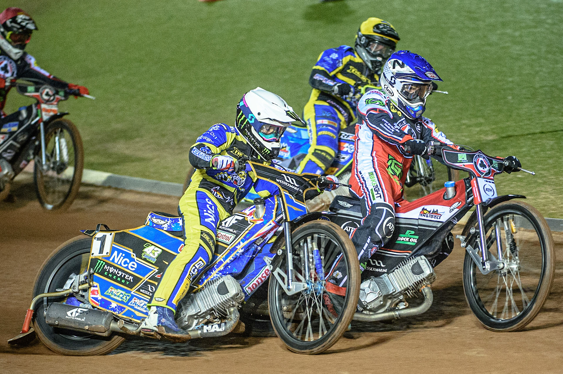 MANCHESTER, UK. OCT 7TH  Richie Worrall  (Blue) splits Jack Holder  (White) and Troy Batchelor  (Yellow) with Dan Bewley  (Red) behind during the SGB Premiership Play off Semi-Final Second Leg between Belle Vue Aces and Sheffield Tigers at the National Speedway Stadium, Manchester on Thursday 7th October 2021. (Credit: Ian Charles | MI News)