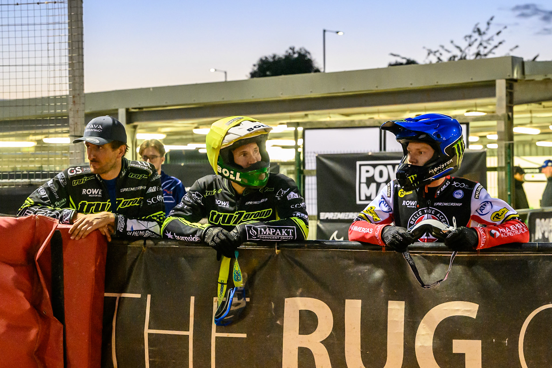 (L to R) Adam Ellis of Ipswich Witches , Jason Doyle of Ipswich Witches  and Dan Bewley of Belle Vue Aces watch the track prep before the final heat during the Rowe Motor Oil Premiership match between Belle Vue Aces and Ipswich Witches at the National Speedway Stadium, Manchester on Monday 4th August 2025. (Photo: Ian Charles | MI News)