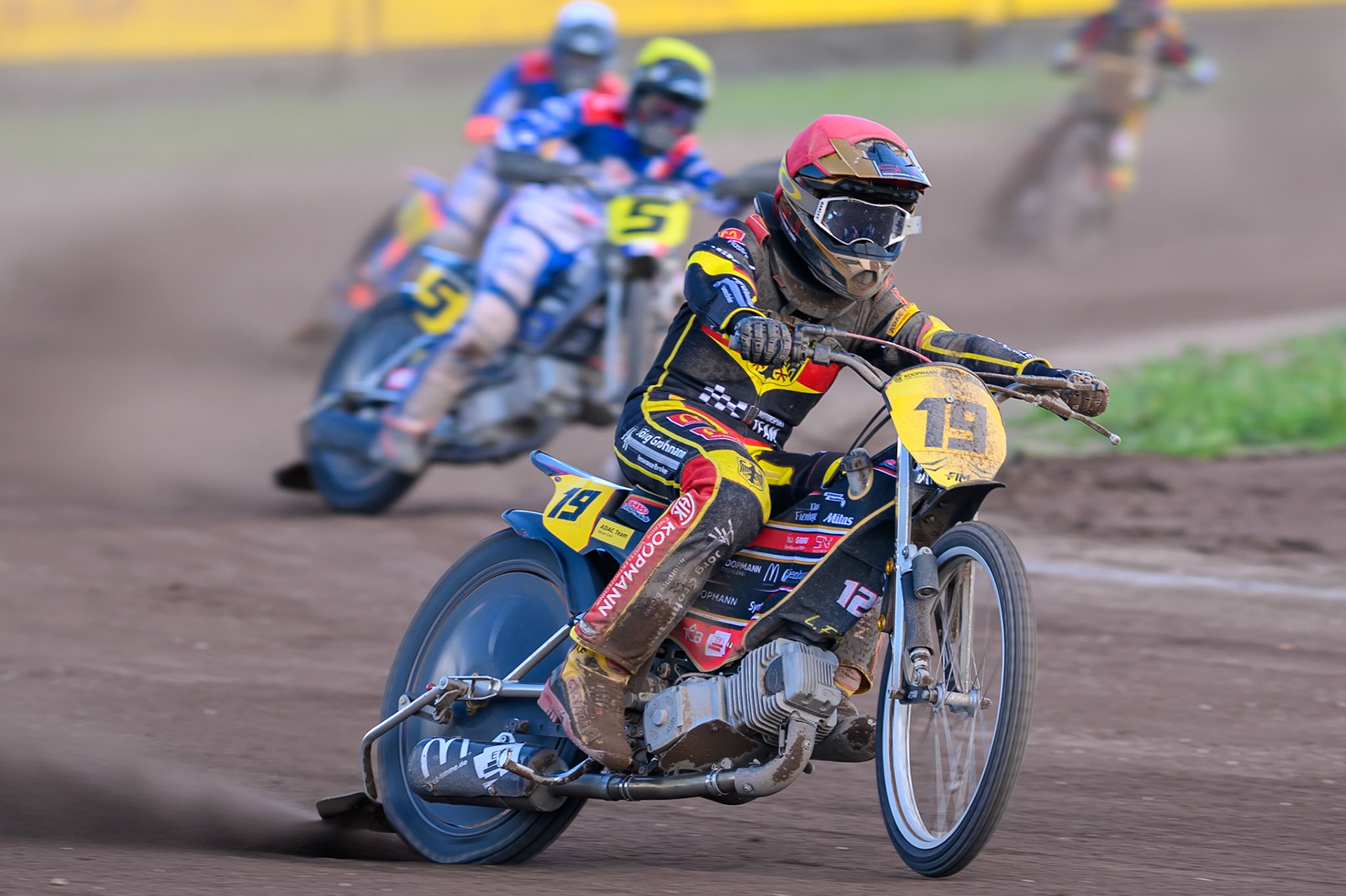 Lukas Fienhage (19) of Germany in Red leading Tino Bouin (5) of France  in Green and lt6\in Black &amp; White  during the FIM Long Track of Nations 2026 at the Speed Centre Roden in the Netherlands on Sunday 20th September 2026. (Photo: Ian Charles | MI News)