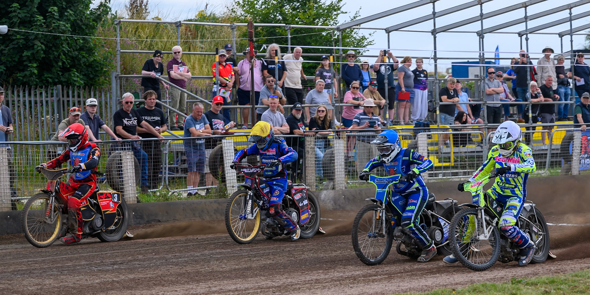 (L to R) Luke Harris of Buxton Bulls in Red , Emerson Betty of Oxford Chargers in Yellow , Arran Butcher of Buxton Bulls in Blue  and Darryl Ritchings of Oxford Chargers in White  leave the start in Heat 9 during the WSRA National Development League match between Buxton Bulls and Oxford Chargers at Hi-Edge Speedway, Buxton on Sunday 2nd August 2026. (Photo: Ian Charles | MI News)