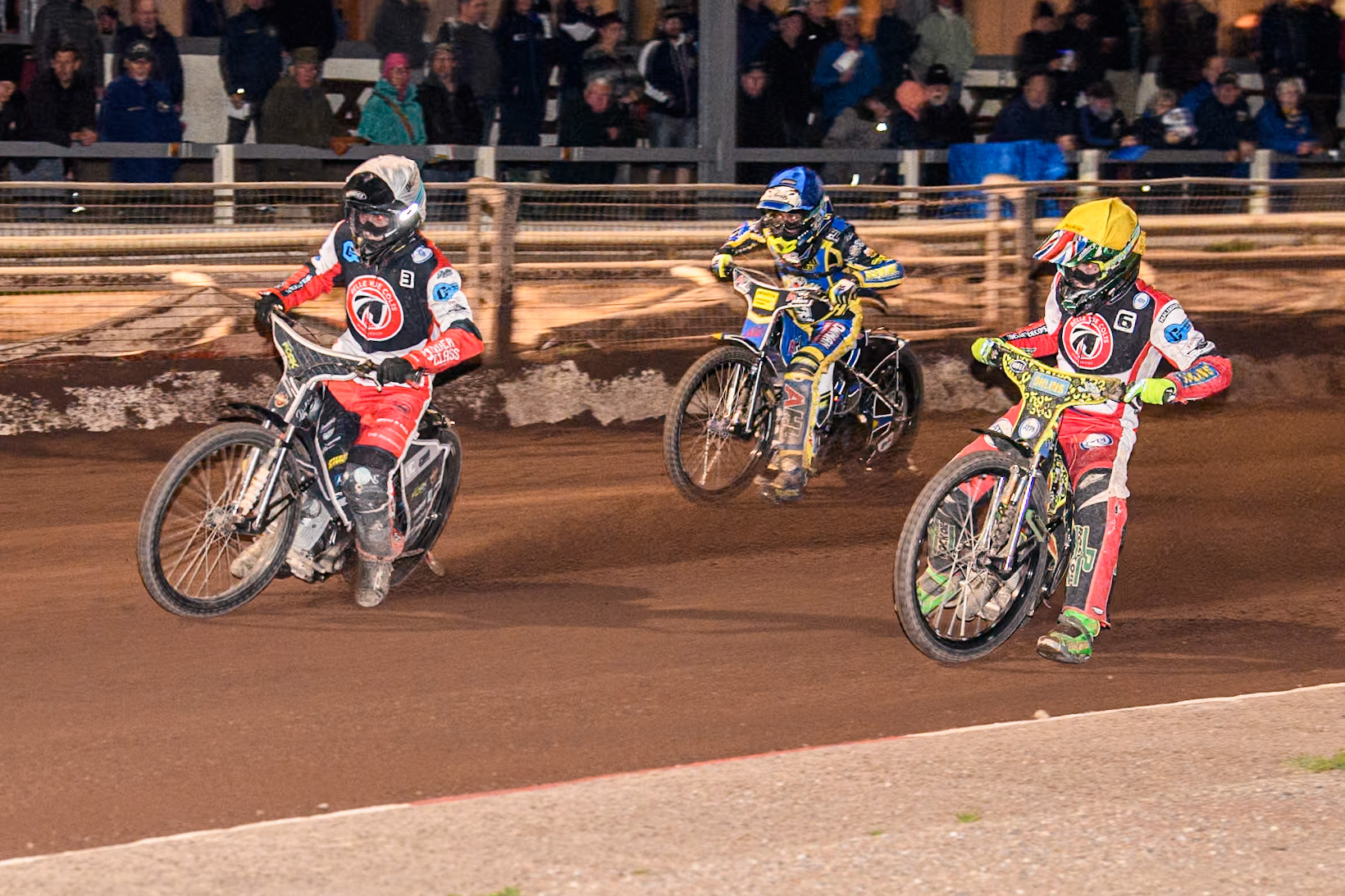 Belle Vue Colts' Matt Marson in White and Belle Vue Colts' William Cairns  in Yellow leading Sheffield Tiger Cubs' Jamie Etherington in Blue during the WSRA National Development League match between Sheffield Tiger Cubs and Belle Vue Colts at Owlerton Stadium, Sheffield on Thursday 12th September 2024. (Photo: Ian Charles | MI News)