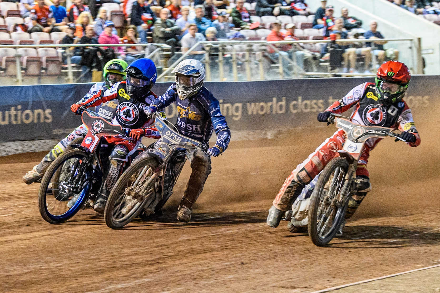Belle Vue Aces' Dan Bewley  in Red rides inside Kings Lynn Stars' Jan Kvech  in White, Belle Vue Aces' Brady Kurtz  in Blue and Kings Lynn Stars' Guest Rider Charles Wright  in Yellow during the Rowe Motor Oil Premiership match between Belle Vue Aces and King's Lynn Stars at the National Speedway Stadium, Manchester on Monday 12th August 2024. (Photo: Ian Charles | MI News)