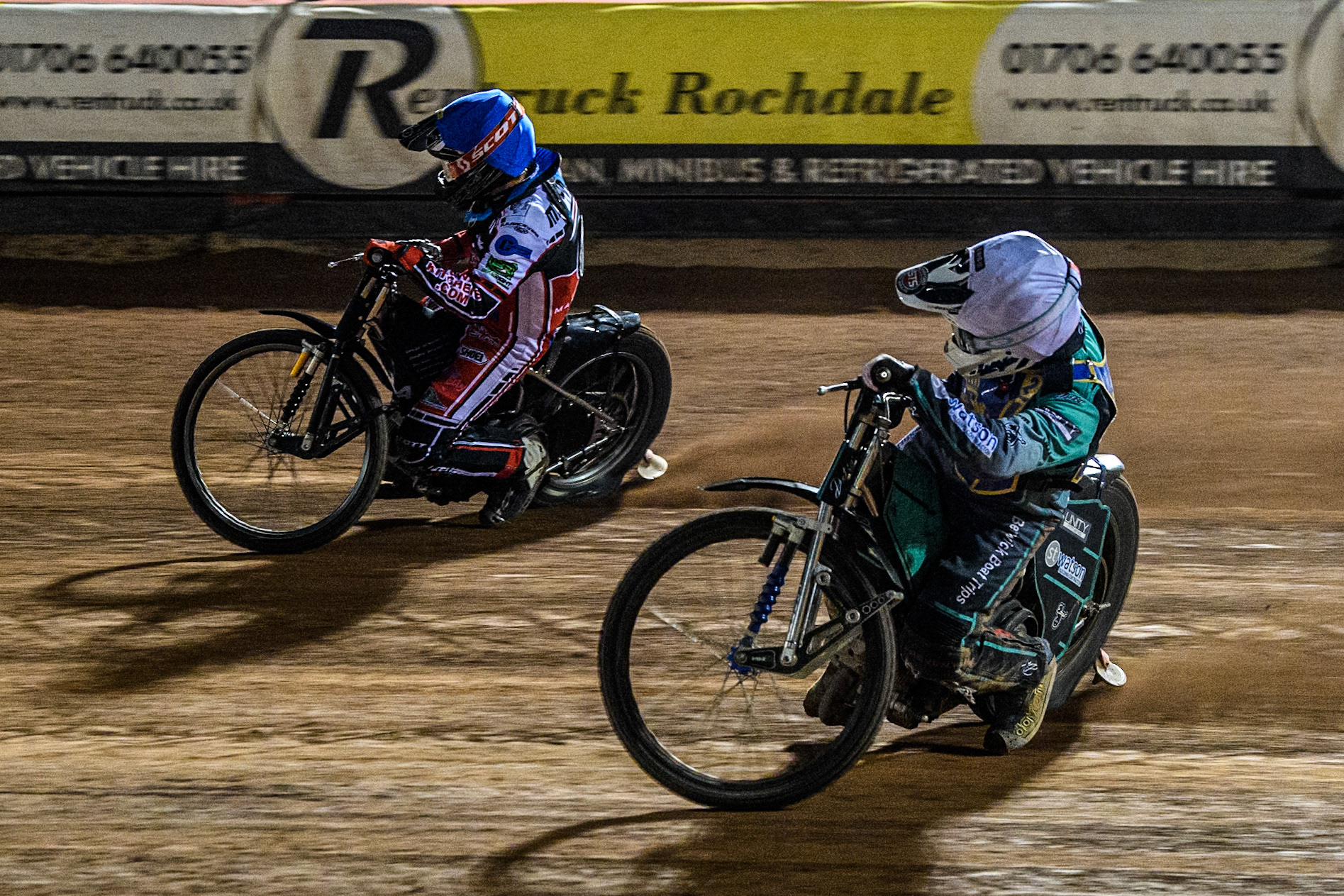 Edinburgh Monarchs' Mason Watson in White rides inside Belle Vue Colts' Harry McGurk in Blue during the WSRA National Development League match between Belle Vue Aces and Edinburgh Monarchs at the National Speedway Stadium, Manchester on Friday 30th August 2024. (Photo: Ian Charles | MI News)