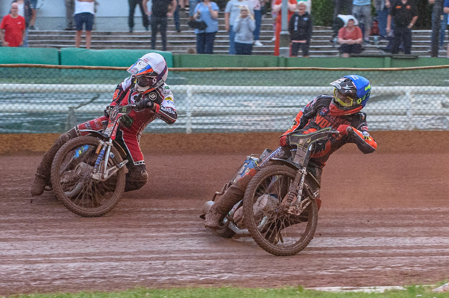 WOLVERHAMPTON, UK. JULY 26TH Ryan Douglas  (Blue) inside Steve Worrall  (White) during the SGB Premiership match between Wolverhampton Wolves and Belle Vue Aces at the Ladbroke Stadium, Wolverhampton on Monday 26th July 2021. (Credit: Ian Charles | MI News)