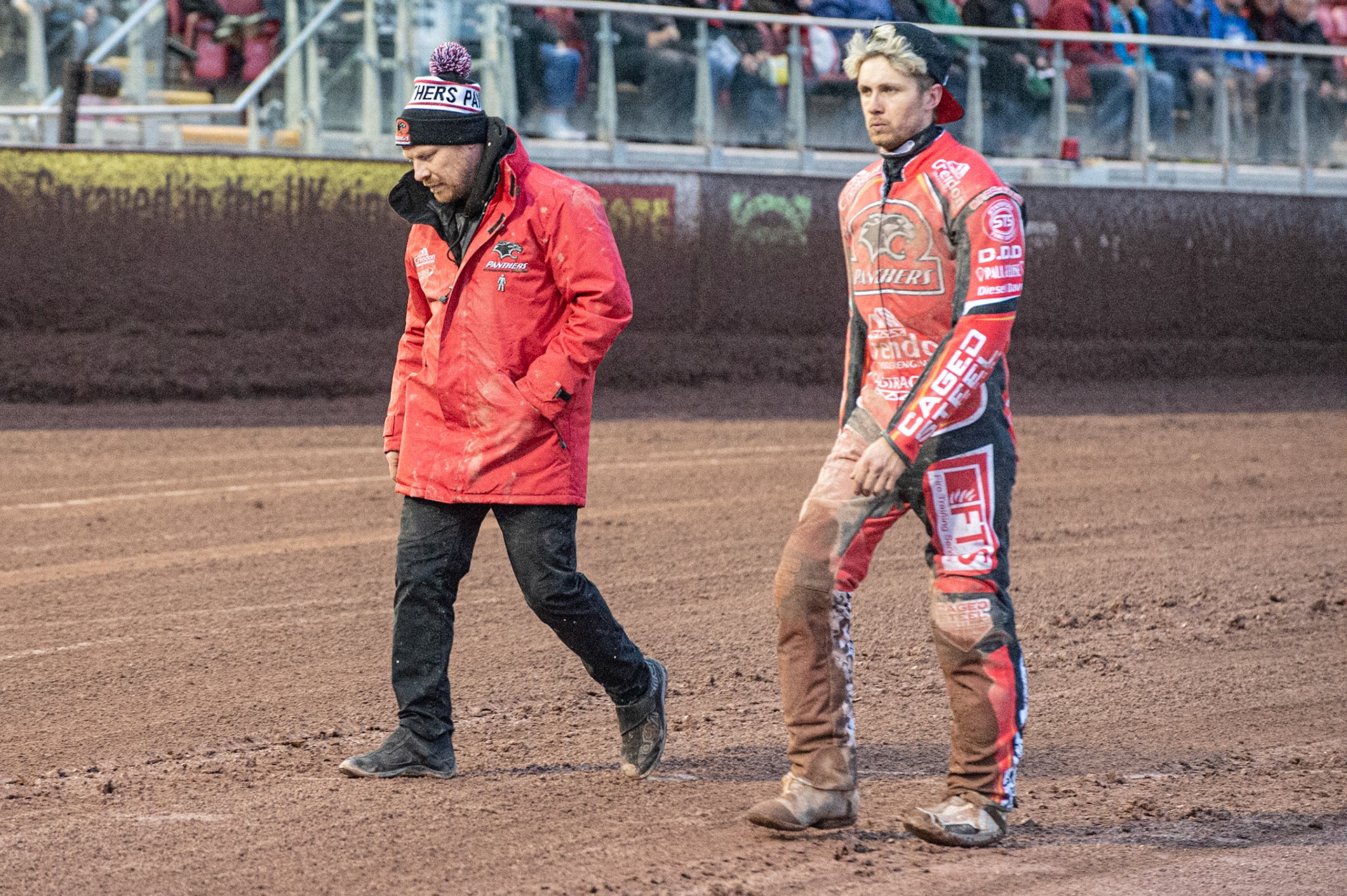 Photo by Ian Charles:

Peterborough Panthers manager Carl Johnson (left) and Aaron Summers  walk back to the pits after Bradley Wilson-Dean’s fall 

Belle Vue Aces v Peterborough Panthers, British Speedway Premiership, National Speedway Stadium, Manchester, Thursday, 13, June, 2019