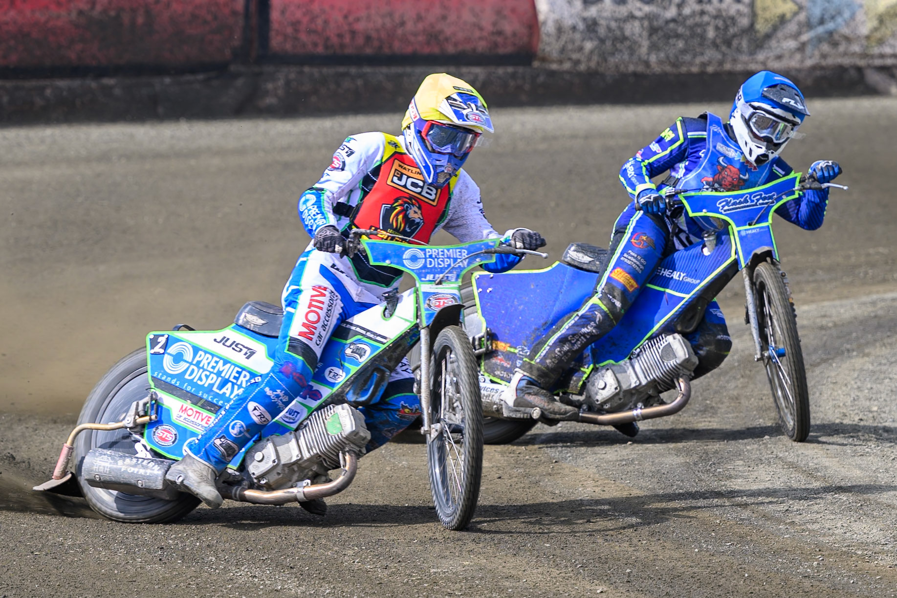 Tom Spencer of Leicester Lion Cubs  in Yellow leading Arran Butcher of Buxton Bulls  in Blue during the Challenge match between Buxton Bulls and Leicester Lion Cubs at Hi-Edge Speedway, Buxton on Sunday 26th April 2026. (Photo: Ian Charles | MI News)