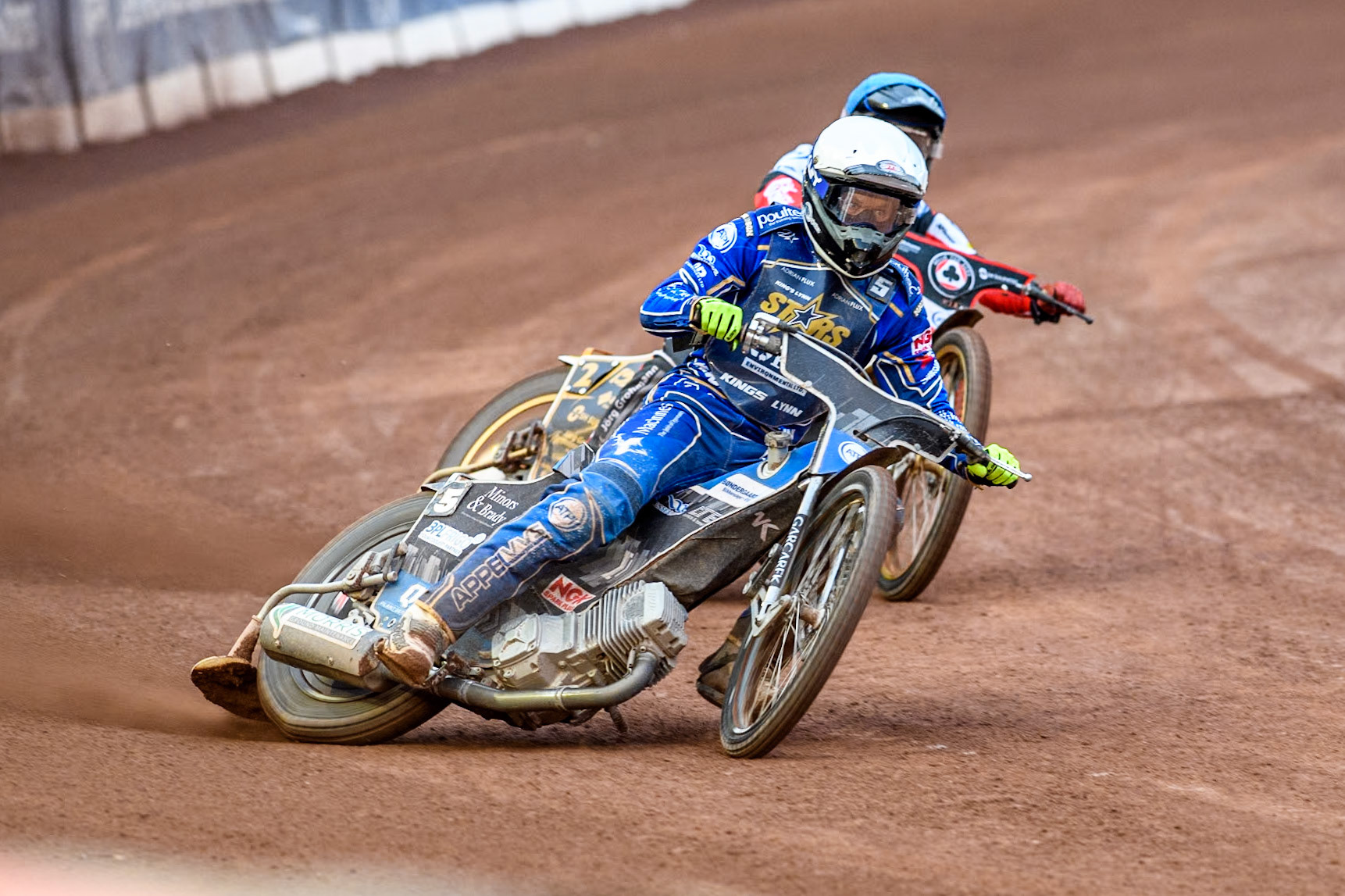 King Lynn Stars' Nicolai Klindt in White leading Belle Vue Aces' Norick Blodorn in Blue during the Rowe Motor Oil Premiership match between Belle Vue Aces and King's Lynn Stars at the National Speedway Stadium, Manchester on Monday 20th May 2024. (Photo: Ian Charles | MI News)