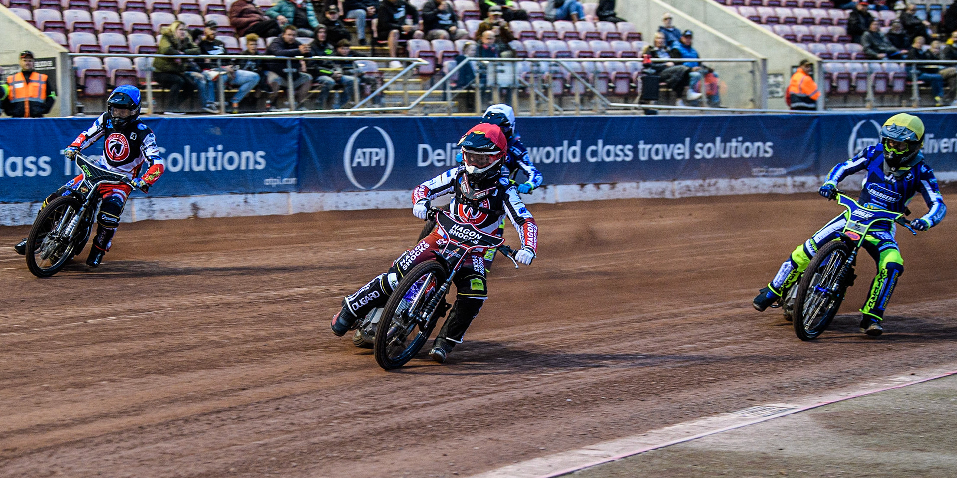 Sam Hagon  (Red) leads Matt Marson  (Blue) Jody Scott  (White) and Jacob Clouting  (Yellow) during the National Development League match between Belle Vue Colts and Oxford Chargers at the National Speedway Stadium, Manchester on Friday 12th May 2023. (Photo: Ian Charles | MI News)