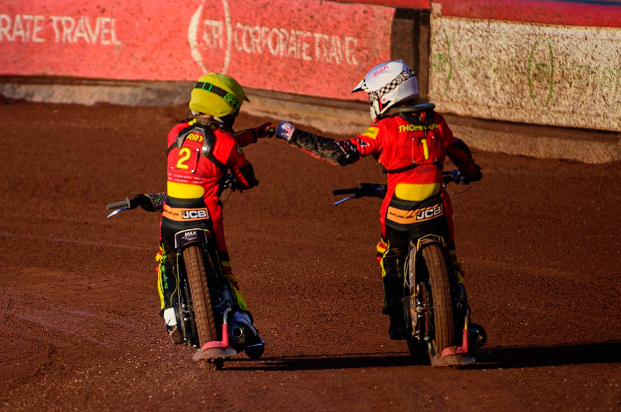 Max Perry   (Yellow) and Dan Thompson   (White) celebrate their maximum points heat win during the National Development League match between Belle Vue Aces and Leicester Lions at the National Speedway Stadium, Manchester on Friday 19th August 2022. (Credit: Ian Charles | MI News)