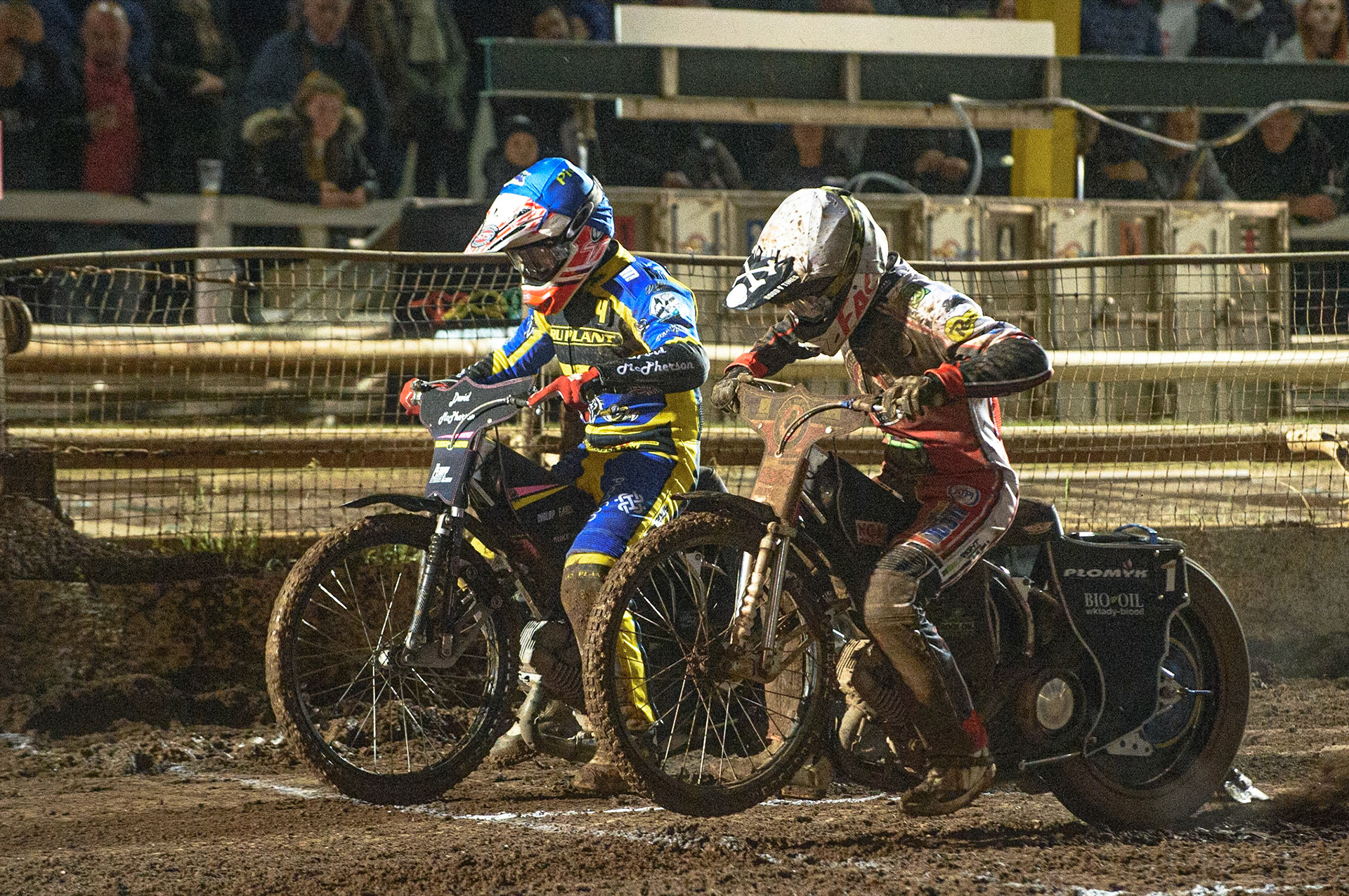 SHEFFIELD, UK. OCT 4THJosh Pickering  (Blue) and Dan Bewley  (White) leave the gate during the SGB Premiership Semi Final Playoff 1st Leg between Sheffield Tigers and Belle Vue Aces at Owlerton Stadium, Sheffield on Monday 4th October 2021. (Credit: Ian Charles | MI News)