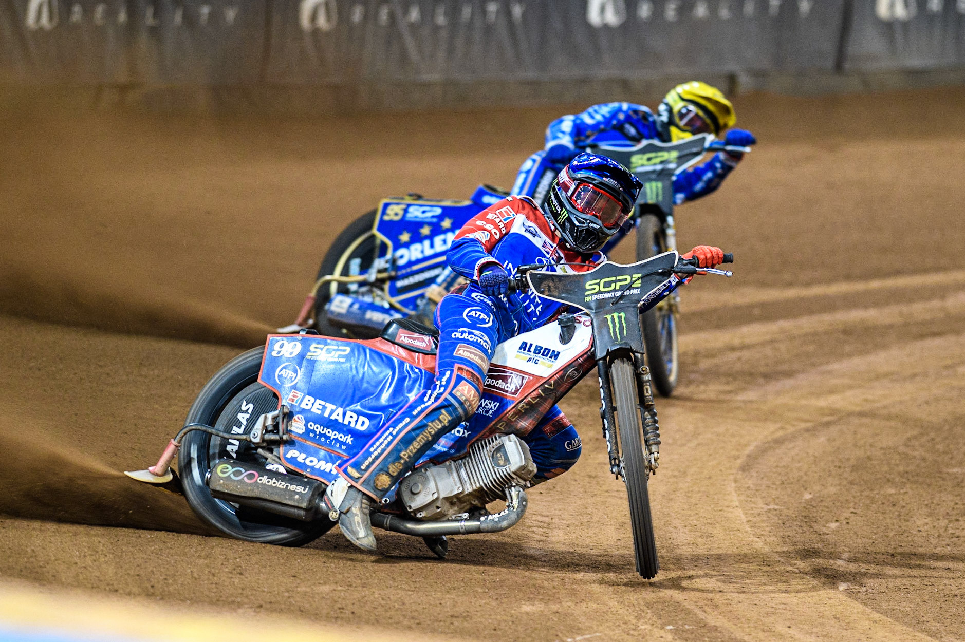 Dan Bewley (99) (Blue) leads  Bartosz Zmarzlik (95) (Yellow) during the FIM Speedway Grand Prix of Great Britain at the Principality Stadium, Cardiff on Saturday 2nd September 2023. (Photo: Ian Charles | MI News)