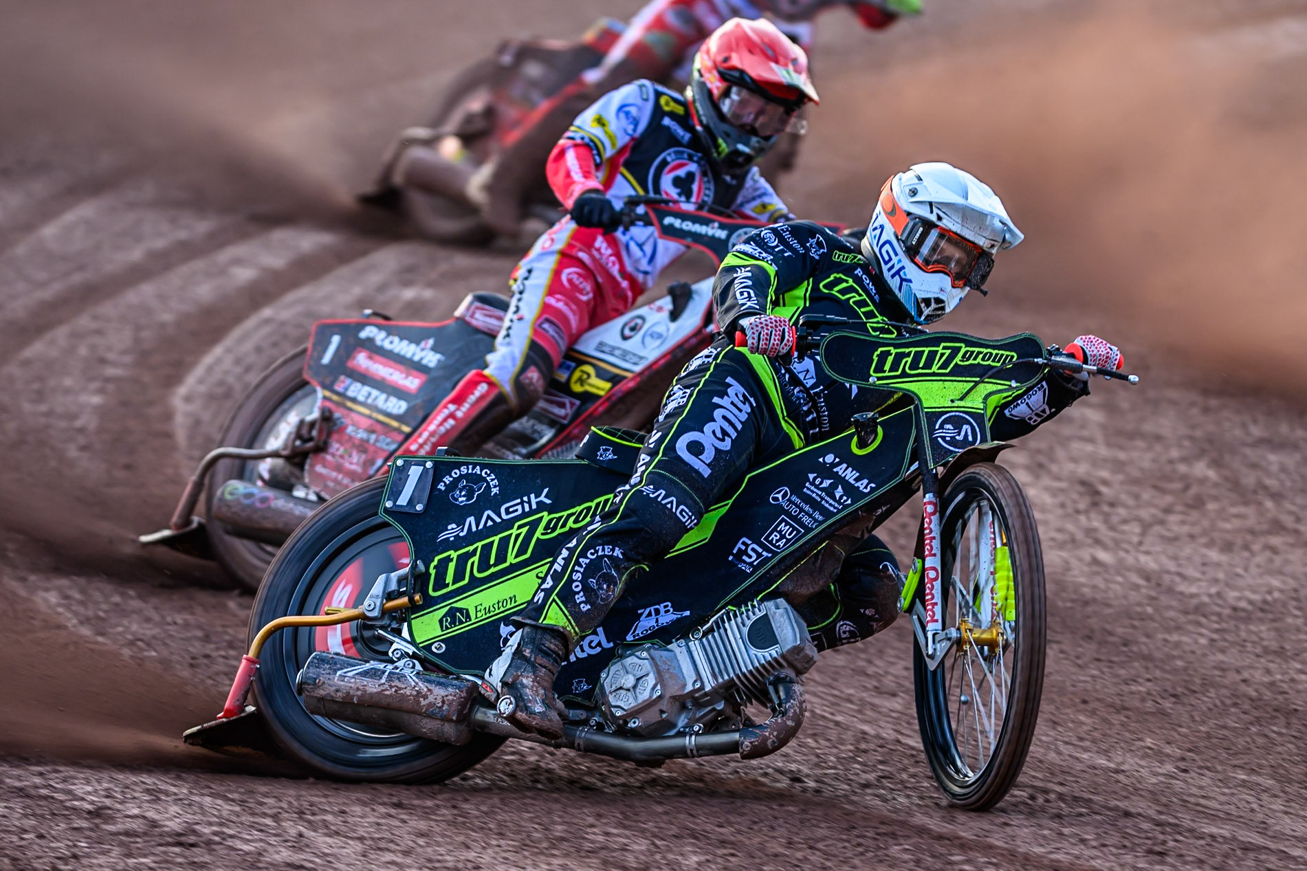 Ipswich Witches' Emil Saifutdinov  in White leading Belle Vue Aces' Dan Bewley  in Red during the Rowe Motor Oil Premiership match between Belle Vue Aces and Ipswich Witches at the National Speedway Stadium, Manchester on Monday 30th June 2025. (Photo: Ian Charles | MI News)