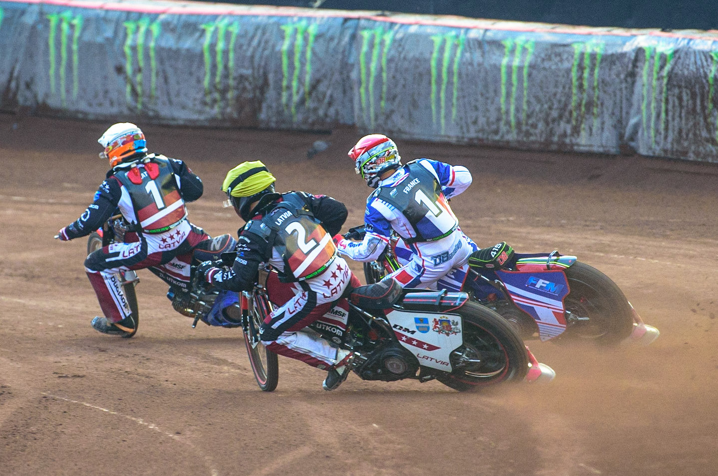 MANCHESTER, UK. OCT 16TH Olegs Mijailovs of Latvia (Yellow) chases David Bellego of France (Red) and Andzejs Lebedevs of Latvia (White) during the Monster Energy FIM Speedway of Nations at the National Speedway Stadium, Manchester on Saturday  16th October 2021. (Credit: Ian Charles | MI News)