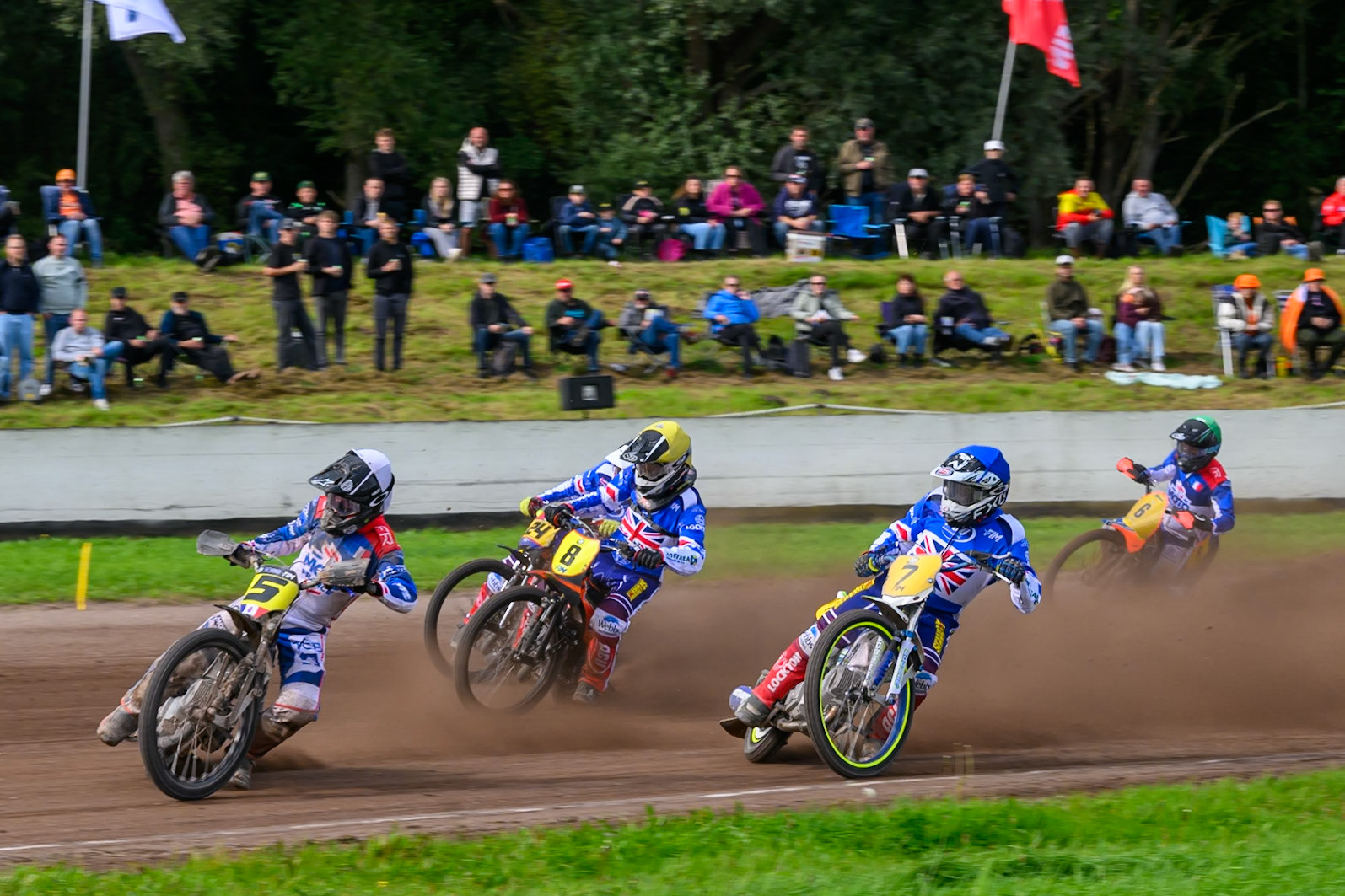 Tino Bouin (5) of France in White leading Chris Harris (7) of Great Britain in Blue , Zach Wajtknecht (8) of Great Britain in Yellow  and Jake Mulford (24) of Great Britain in Black &amp; White with Jordan Dubernard (6) of Francein Green  behind during the FIM Long Track of Nations 2026 at the Speed Centre Roden in the Netherlands on Sunday 20th September 2026. (Photo: Ian Charles | MI News)