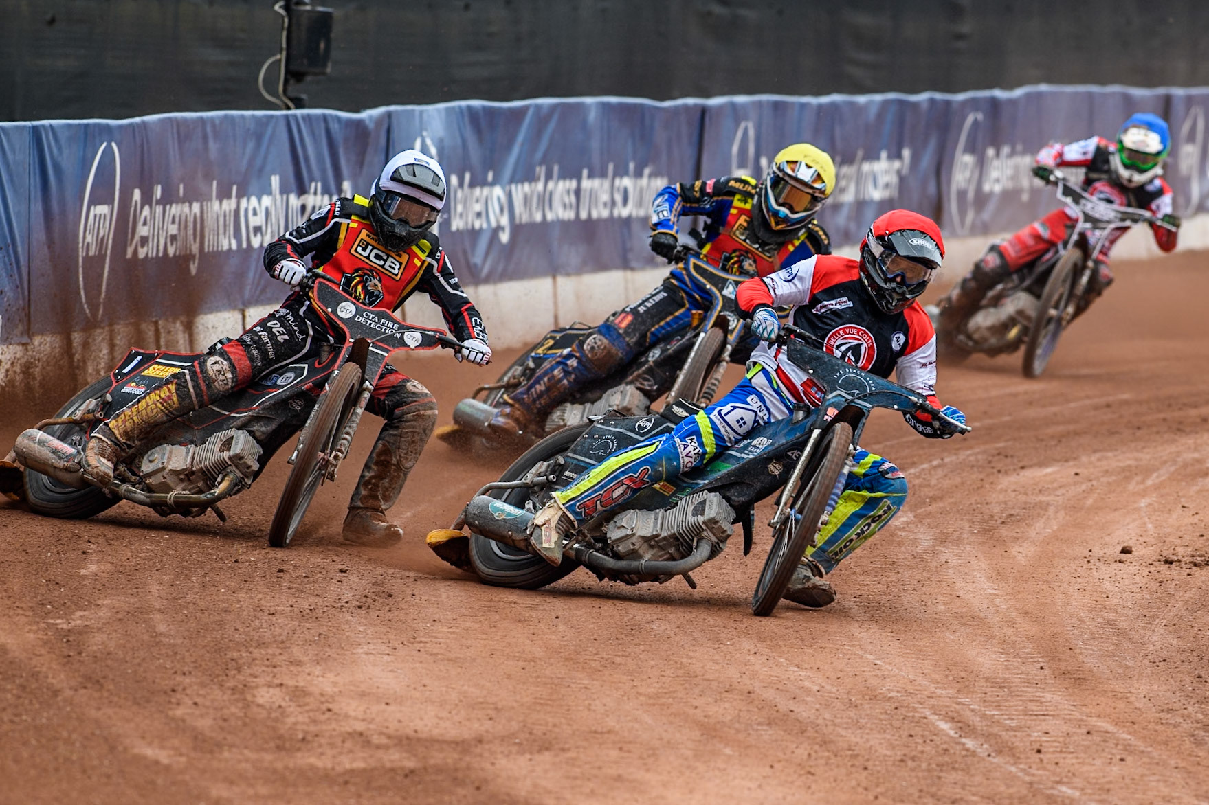 Belle Vue Colts' Jack Kingston  in Red leading Leicester Lion Cubs' Guest Rider Ben Morley in White, Leicester Lion Cubs' Eli Meadows  in Yellow and Belle Vue Colts' Jack Shimelt  in Blue during the WSRA National Development League match between Belle Vue Colts and Leicester Lion Cubs at the National Speedway Stadium, Manchester on Friday 18th April 2025. (Photo: Ian Charles | MI News)