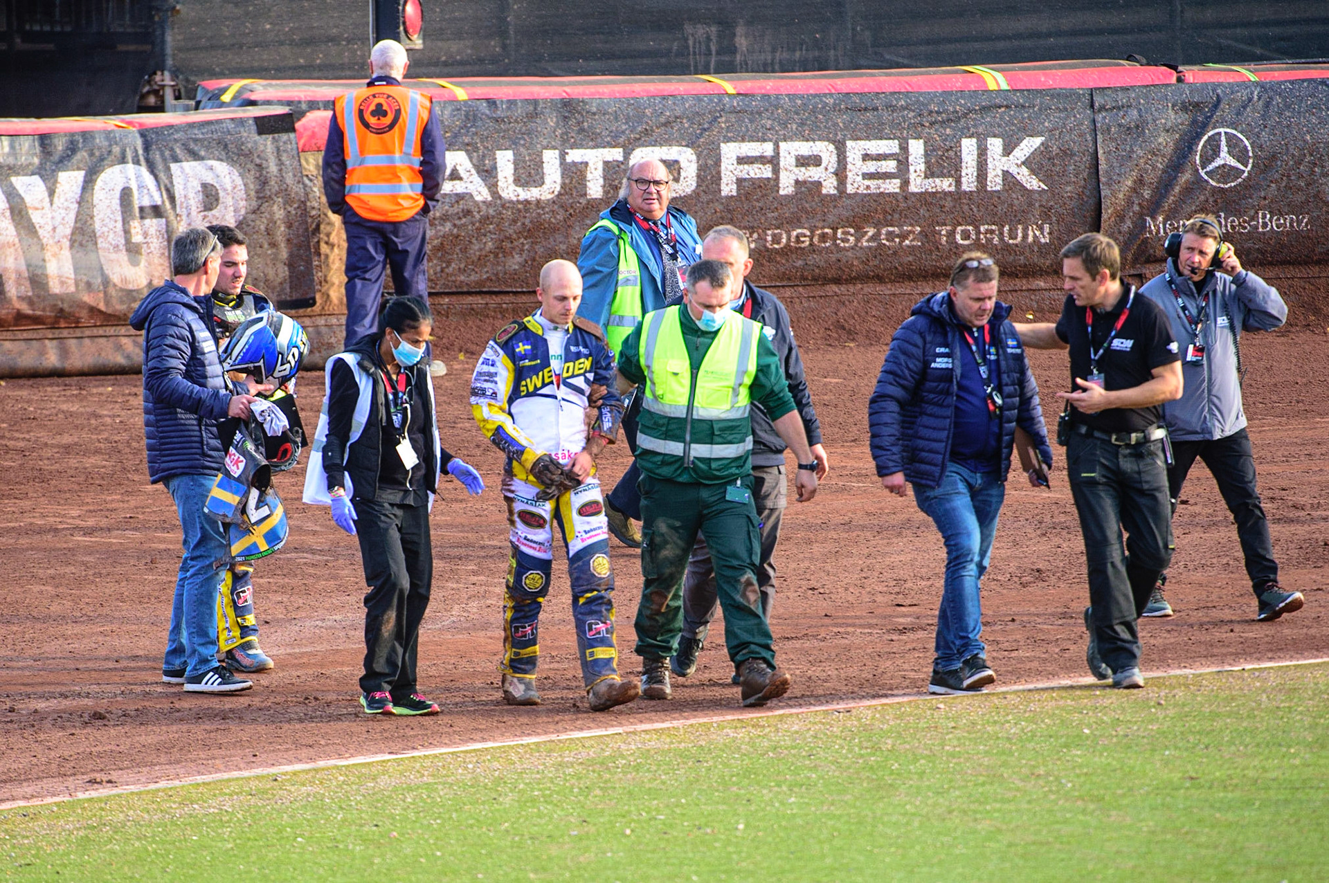 MANCHESTER, UK. OCT 16TH The Swedish riders walk off after their crash with the medical staff and members of their support team during the Monster Energy FIM Speedway of Nations at the National Speedway Stadium, Manchester on Saturday  16th October 2021. (Credit: Ian Charles | MI News)
