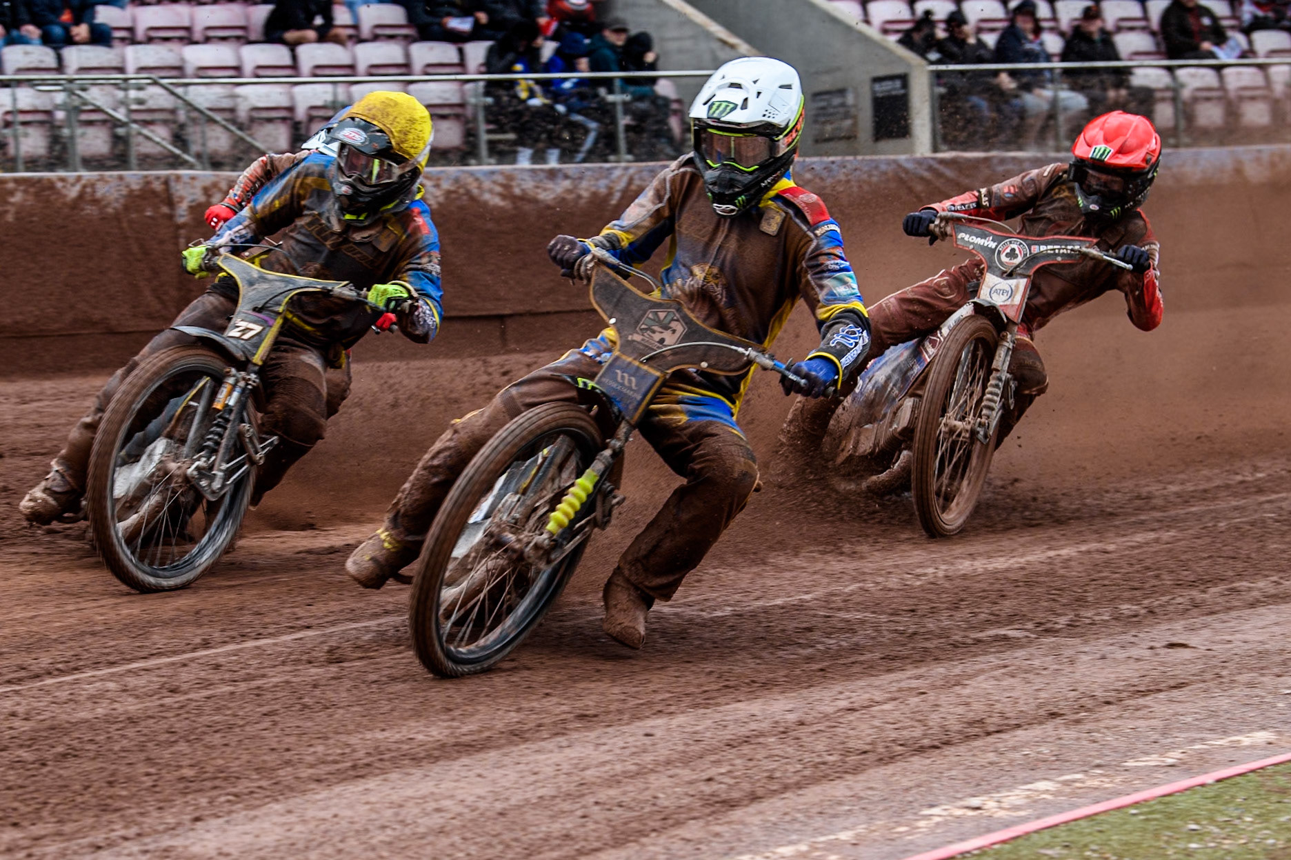 Chris Holder in White and Sheffield Tigers' Guest rider Tom Brennan in Yellow leading Belle Vue Aces' Dan Bewley in Red and Belle Vue Aces' Connor Mountain in Blue during the Rowe Motor Oil Premiership match between Belle Vue Aces and Sheffield Tigers at the National Speedway Stadium, Manchester on Monday 27th May 2024. (Photo: Ian Charles | MI News)