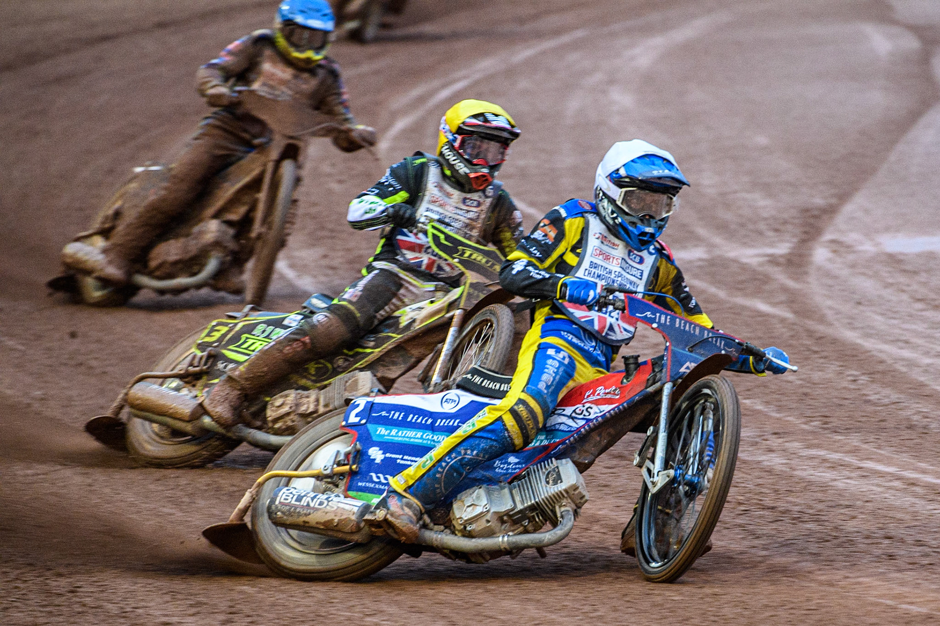 Adam Ellis (White) leads Danny King (Yellow) and Chris Harris (Blue) during the Sports Insure British Speedway Final at the National Speedway Stadium, Manchester on Monday 14th August 2023. (Photo: Ian Charles | MI News)