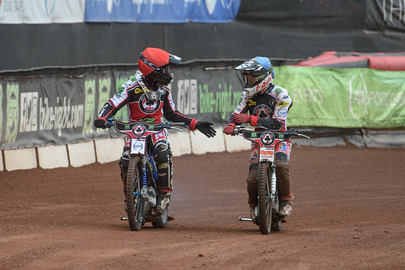 MANCHESTER, UK. AUGUST 30TH Brady Kurtz  (Red) and Dan Bewley  (Blue) celebrate their heat win during the SGB Premiership match between Belle Vue Aces and Wolverhampton Wolves at the National Speedway Stadium, Manchester on Monday 30th August 2021. (Credit: Ian Charles | MI News)