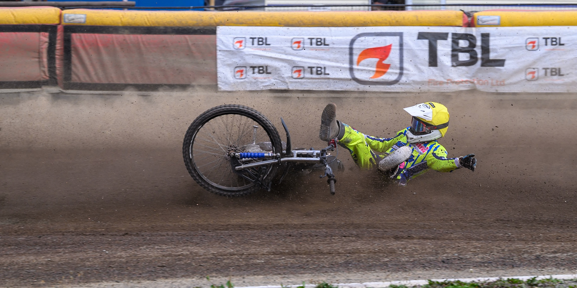 Harry Fletcher of Oxford Chargers in Yellow  falls during the WSRA National Development League match between Buxton Bulls and Oxford Chargers at Hi-Edge Speedway, Buxton on Sunday 2nd August 2026. (Photo: Ian Charles | MI News)