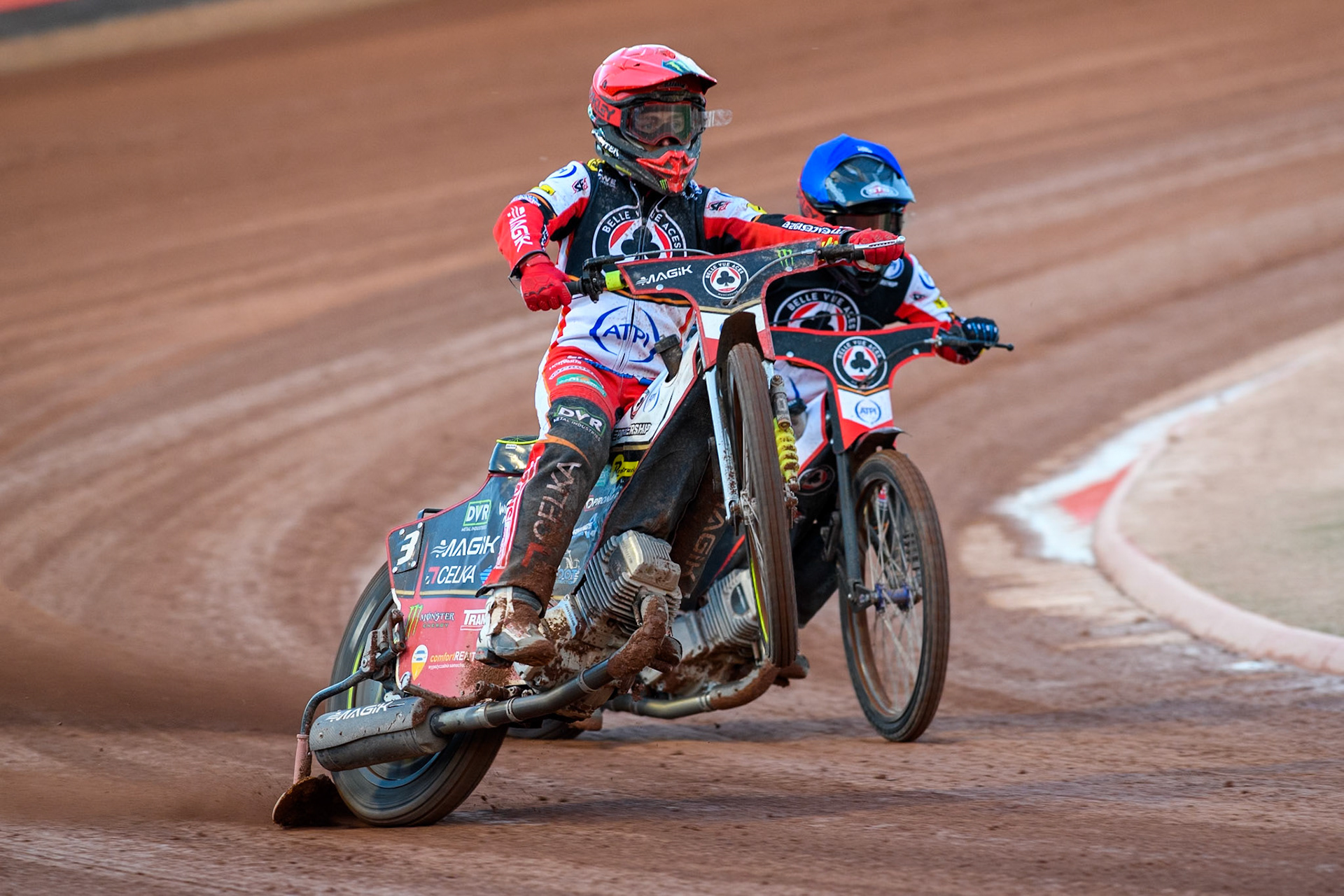 Belle Vue Aces' Jaimon Lidsey in Red starts to rear ahead of team mate Zach Cook in Blue during the Rowe Motor Oil Premiership match between Belle Vue Aces and Leicester Lions at the National Speedway Stadium, Manchester on Monday 19th May 2025. (Photo: Ian Charles | MI News)