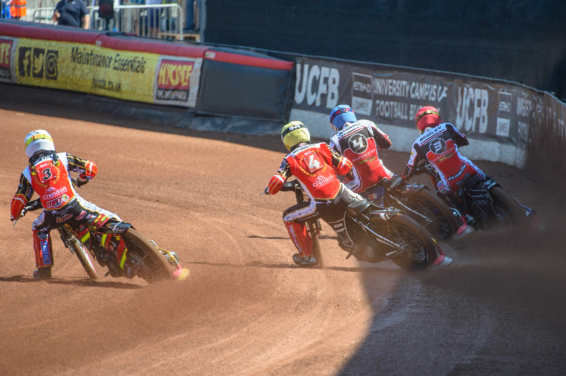 MANCHESTER, UK. MAY 31ST  Michael Palm Toft  (White) and Scott Nicholls  (Yellow) chase Steve Worrall  (Blue) and Dan Bewley  (Red) during the SGB Premiership match between Belle Vue Aces and Peterborough at the National Speedway Stadium, Manchester on Monday 31st May 2021. (Credit: Ian Charles | MI News)