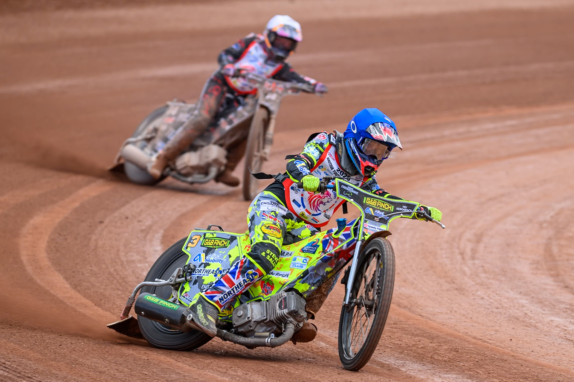 BRITISH YOUTH CHAMPIONSHIP (250cc): Archie Rolph (3) in Blue leading Kane Newby (14) in White during the British Youth Speedway Championship at the National Speedway Stadium, Manchester on Sunday 10th May 2026. (Photo: Ian Charles | MI News)