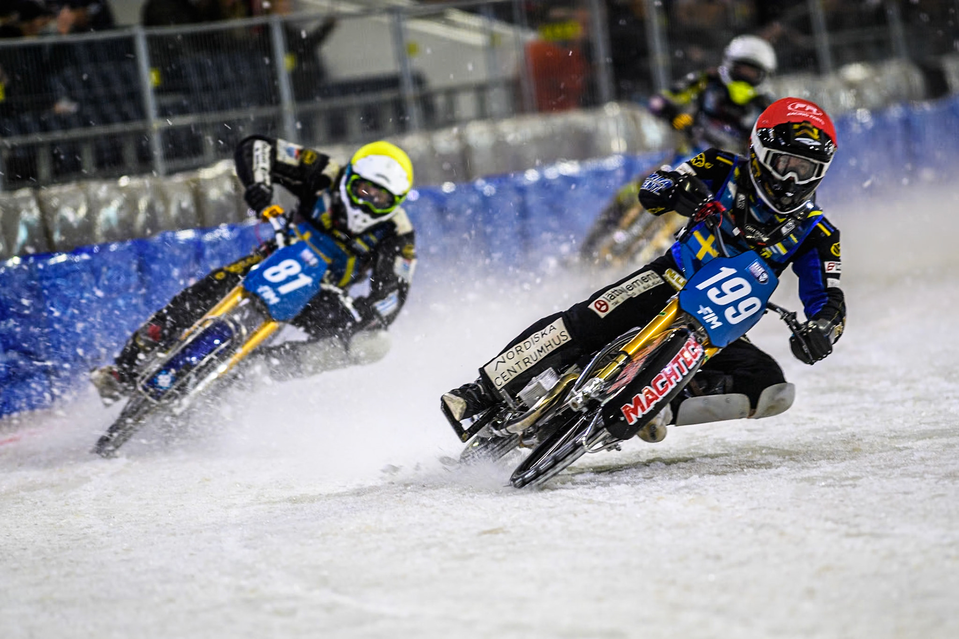 Sweden's Martin Haarahiltunen (199) in Red leading Sweden"s Jimmy Olsén (81) in Yellow and Germany's Max Niedermaier (88) in White  during the FIM Ice Speedway Gladiators World Championship Final 4 at Ice Rink Thialf, Heerenveen on Sunday 7th April 2024. (Photo: Ian Charles | MI News)
