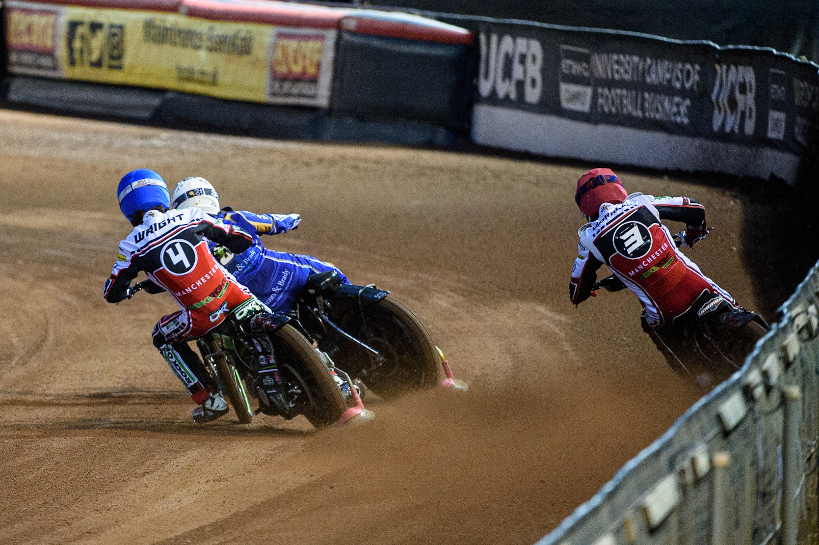 MANCHESTER, UK. SEPT 13TH  Charles Wright  (Blue) and Steve Worrall  (Red) chases Erik Riss  (White) during the SGB Premiership match between Belle Vue Aces and King's Lynn Stars at the National Speedway Stadium, Manchester on Monday 13th September 2021. (Credit: Ian Charles | MI News)
