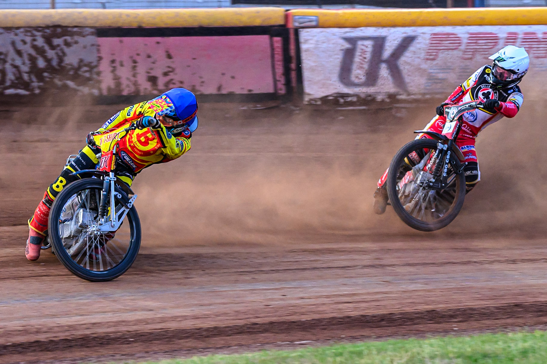 Birmingham Brummies' Jonas Jeppesen in Blue leading Belle Vue Aces' Dan Bewley in White during the Rowe Motor Oil Premiership match between Birmingham Brummies and Belle Vue Aces at Perry Bar Stadium, Birmingham on Monday 2nd June 2025. (Photo: Ian Charles | MI News)