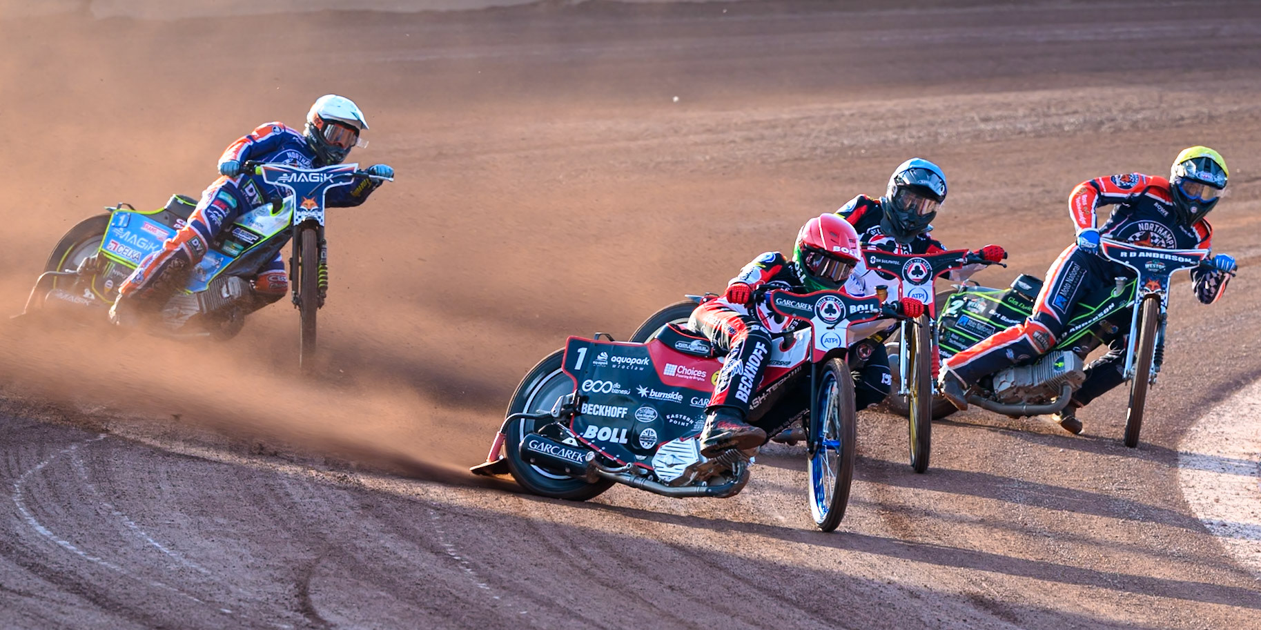 Brady Kurtz of Belle Vue Aces in Red leading Norick Blodorn of Belle Vue Aces in Blue ,Kye Thomson of Northampton Foxes in Yellow  and Jaimon Lidsey of Northampton Foxes  in White during the Rowe Motor Oil Premiership match between Belle Vue Aces and Northampton Foxes at the National Speedway Stadium, Manchester on Monday 13th July 2026. (Photo: Ian Charles | MI News)