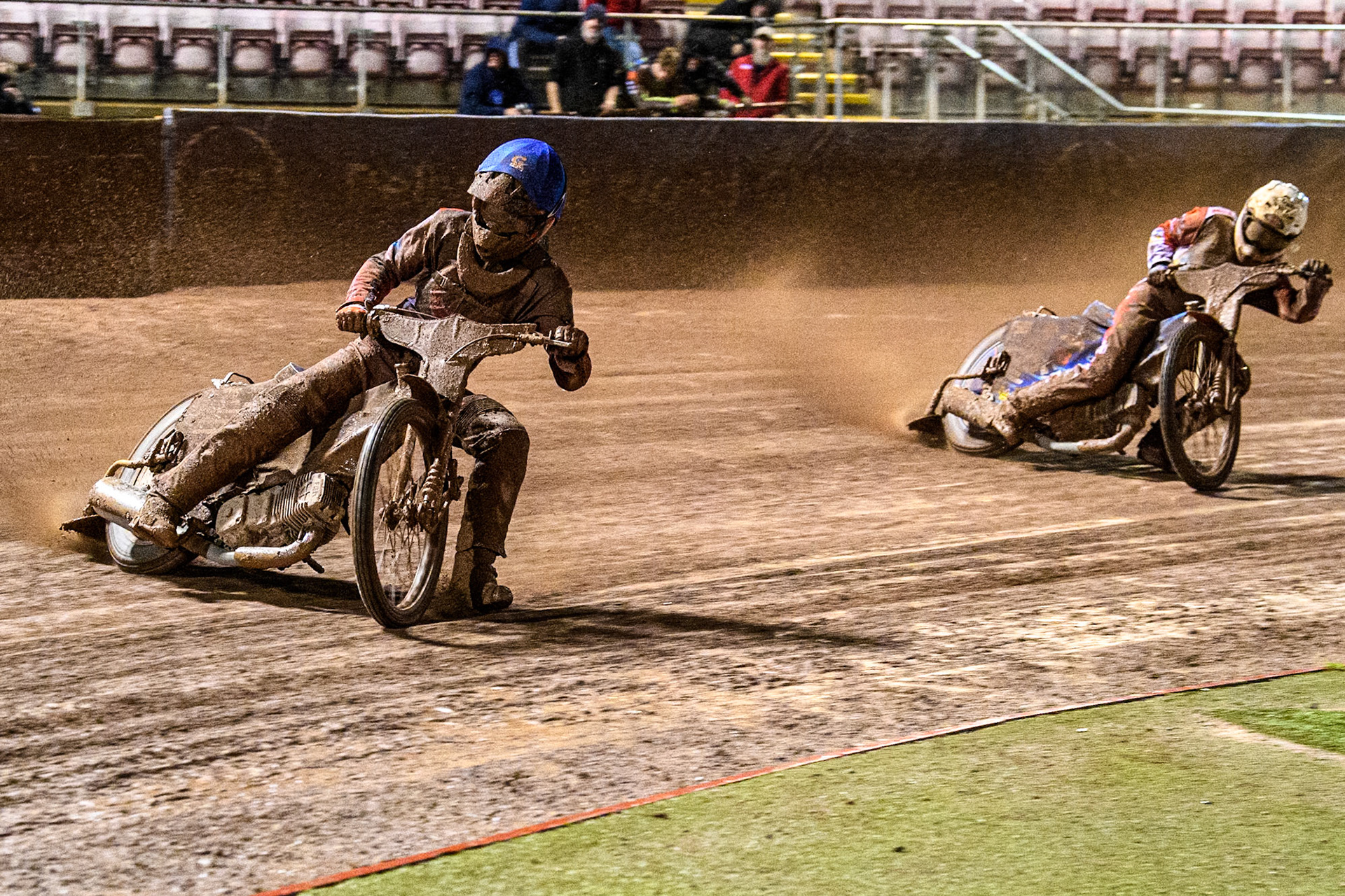 Belle Vue Colts' Freddy Hodder in Blue leading Sheffield Cubs' Stene Pijper  in White during the WSRA National Development League match between Belle Vue Colts and Sheffield Tiger Cubs at the National Speedway Stadium, Manchester on Monday 7th October 2024. (Photo: Ian Charles | MI News)