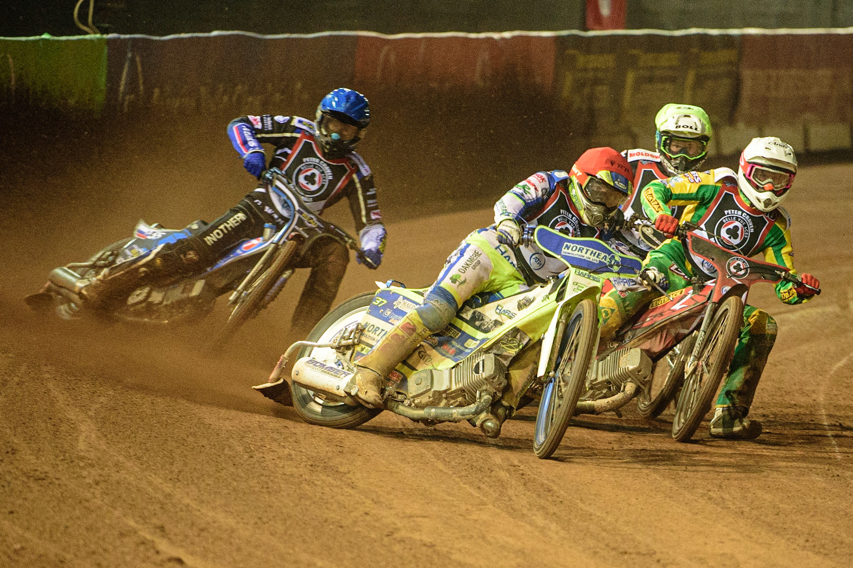 MANCHESTER, UK. MAR 21ST. Chris Harris (Red) leads Max Fricke (White), Matej Žagar  (Blue) and Jason Doyle (Yellow) during the ATPI Peter Craven Memorial Trophy at the National Speedway Stadium, Manchester on Monday 21st March 2022. (Credit: Ian Charles | MI News)