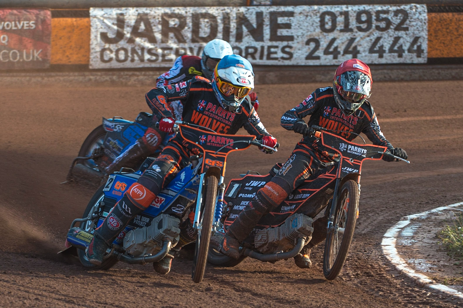 WOLVERHAMPTON, UK. JUN 20TH Steve Worrall  (Blue) and Sam Masters  (Red) lead Matej Zagar   (White) during the SGB Premiership match between Wolverhampton Wolves and Belle Vue Aces at Monmore Green Stadium, Wolverhampton on Monday 20th June 2022. (Credit: Ian Charles | MI News)