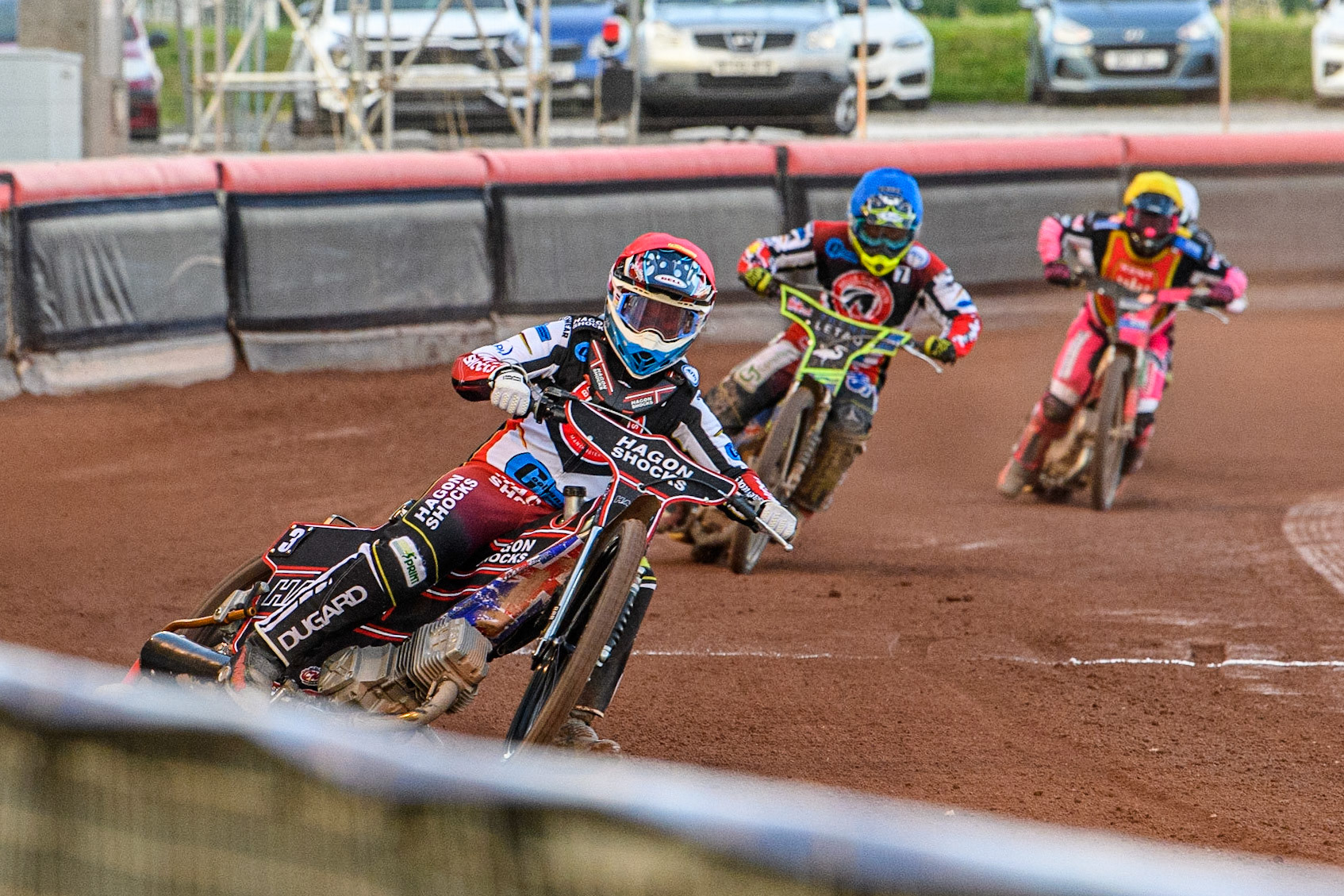 Sam Hagon (Red) leads Luke Muff (Blue), Sam Woolley and Connor King (White) during the National Development League match between Belle Vue Colts and Kent Royals at the National Speedway Stadium, Manchester on Friday 7th July 2023. (Photo: Ian Charles | MI News)