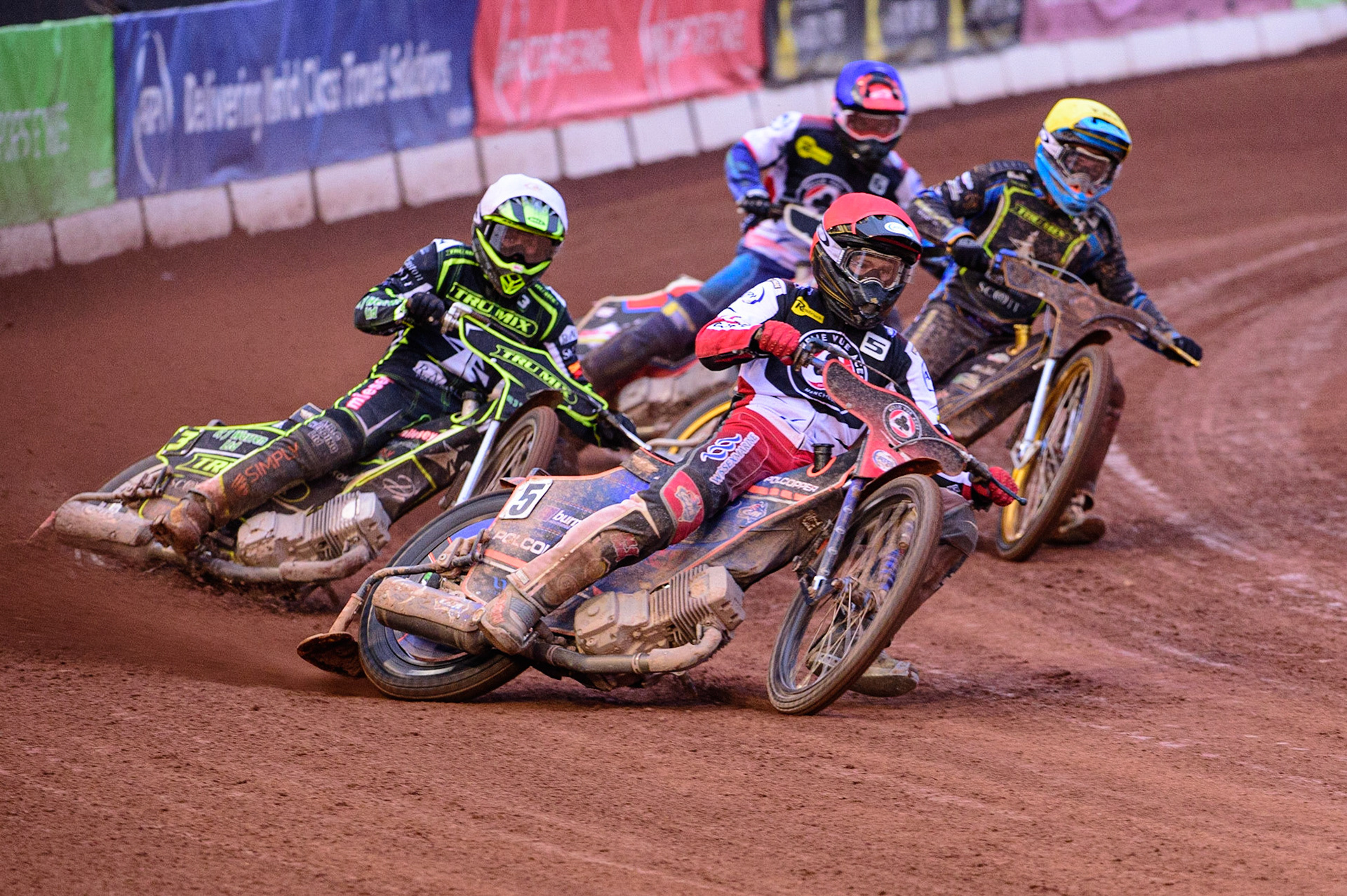 MANCHESTER, UK. JUN 6TH  Brady Kurtz  (Red) leads Danny King  (White) and Justin Sedgmen (Yellow) with Zach Cook (Blue) behind during the SGB Premiership match between Belle Vue Aces and Ipswich Witches at the National Speedway Stadium, Manchester on Monday 6th June 2022. (Credit: Ian Charles | MI News)