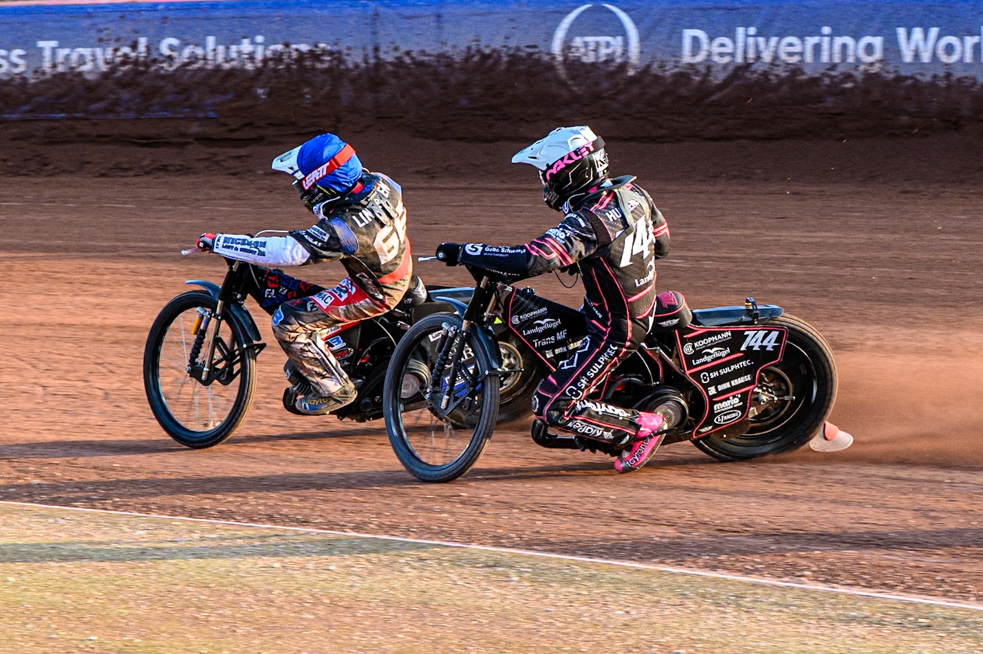 Kai Huckenbeck (744) of Germany in White chases Fredrik Lindgren (66) of Sweden in Blue during the ATPI FIM Speedway Grand Prix Round 5 at the National Speedway Stadium, Manchester, on Saturday 14th June 2025. (Photo: Ian Charles | MI News)