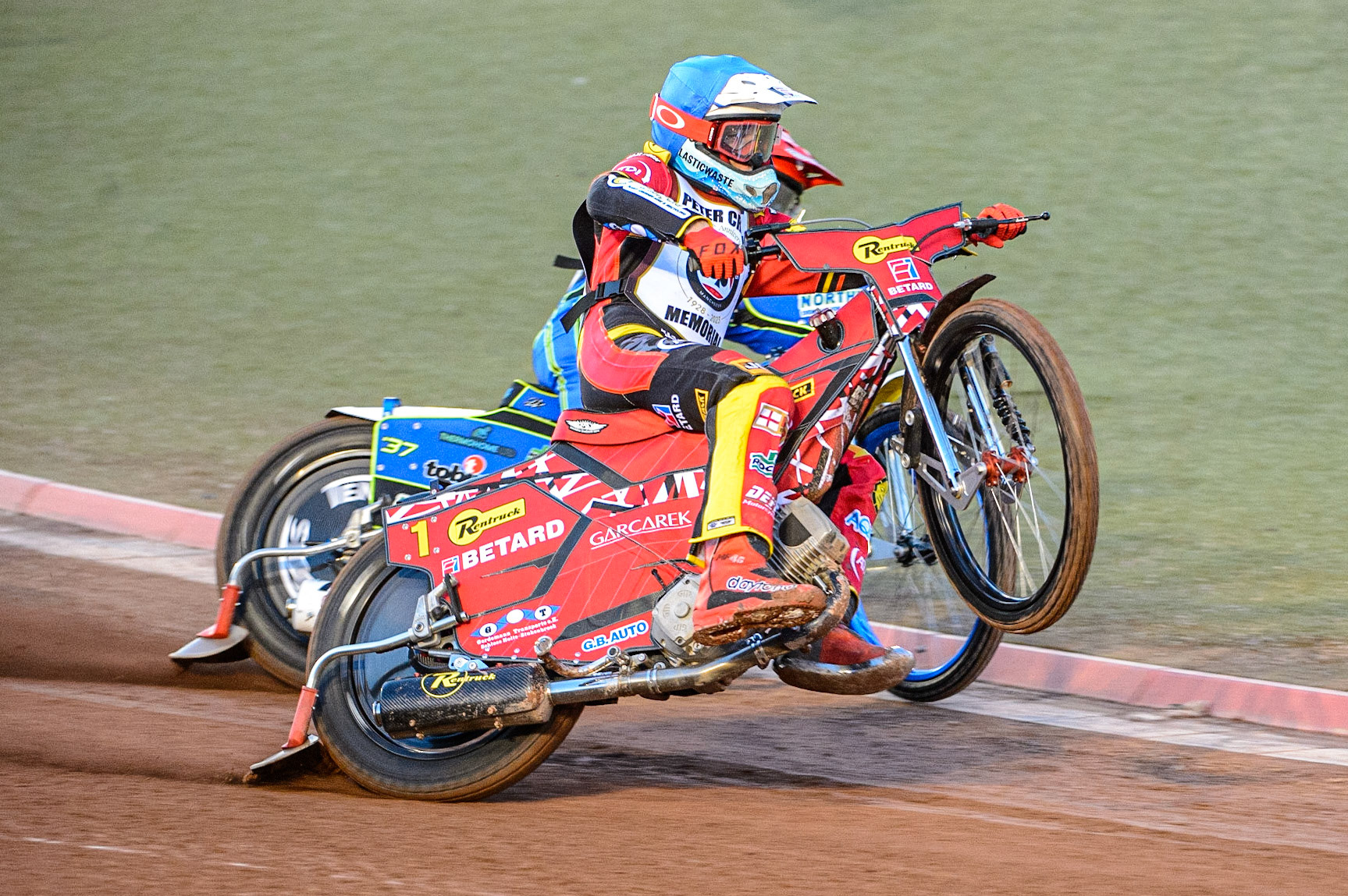 Max Fricke  (Blue) picks up some drive outside Chris Harris (Red)  during the Peter Craven Memorial Trophy  at the National Speedway Stadium, Manchester on Monday 3rd April 2023. (Photo: Ian Charles | MI News)