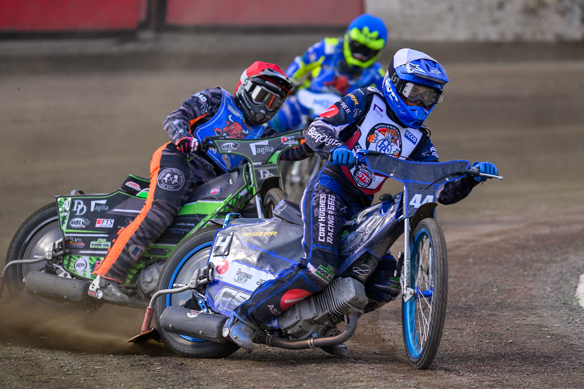 Charlie Southwick of Middlesborough Tigers in White leading Jack Roberts of Buxton Bulls in Red and Will Boraston of Buxton Bulls in Blue during the WSRA National Development League match  between Buxton Bulls and Middlesborough Tigers at Hi-Edge Speedway, Buxton on Sunday 16th August 2026. (Photo: Ian Charles | MI News)