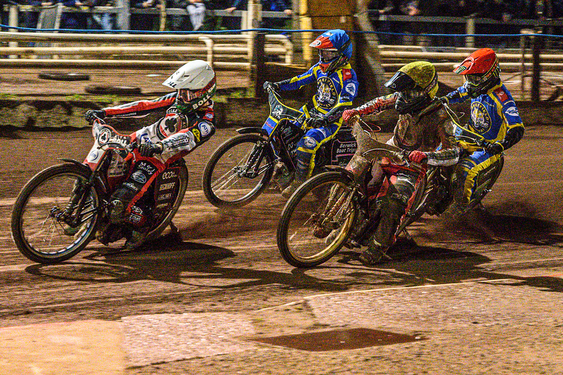 Brady Kurtz of Belle Vue Aces in White leading Norick Blodorn of Belle Vue Aces in Yellow , Leon Flint of Sheffield Tigers in Blue  and Chris Holder of Sheffield Tigers in Red during the Rowe Motor Oil Premiership Grand Final 1st Leg match between Sheffield Tigers and Belle Vue Aces at Owlerton Stadium, Sheffield on Monday 12th October 2026. (Photo: Ian Charles | MI News)